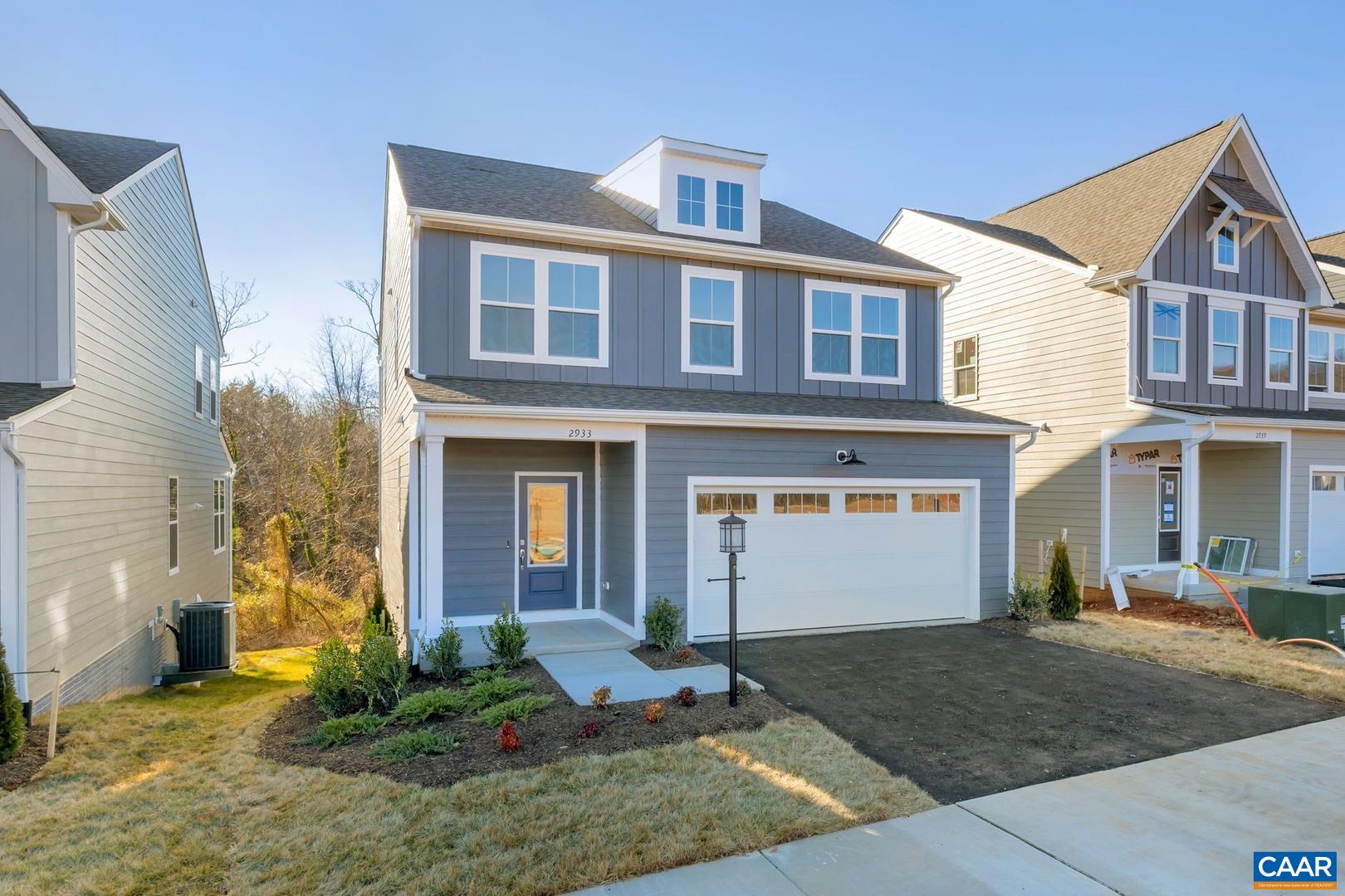 New construction, warranty-backed SINGLE-FAMILY HOME with a FINISHED WALK-OUT BASEMENT on a WOODED HOMESITE with a nearby babbling brook, and a Summer 2025 estimated completion date! With Living Spaces spread among 3 levels, the Rosemund is our largest, most flexible floorplan. Step from your 2-car garage into a convenient Mud Room that leads to either the Main Level dedicated Home Office or an open-concept living space with a wall of windows looking onto your wooded back yard and 12’x15’ Deck. In the Kitchen, white wall cabinets with a navy island and gold accents bring style; plenty of white quartz counterspace and soft-close drawers bring function. Upstairs, welcome to your personal oasis - the generous Primary Suite with double walk-in closets, double bathroom vanities, and a large step-in shower with a seat. Two additional Bedrooms, a Hall Bath, Laundry Room, and Second Living Room round out the Bedroom Level. The WALKOUT Basement has been transformed into a private 905 sqft living area with a Bedroom, Full Bath, HUGE finished Rec Room with a walk-out to the back yard, plus unfinished storage space. Similar photos from previously built homes. Visit the Pleasant Green Single Family Model home to learn more!
