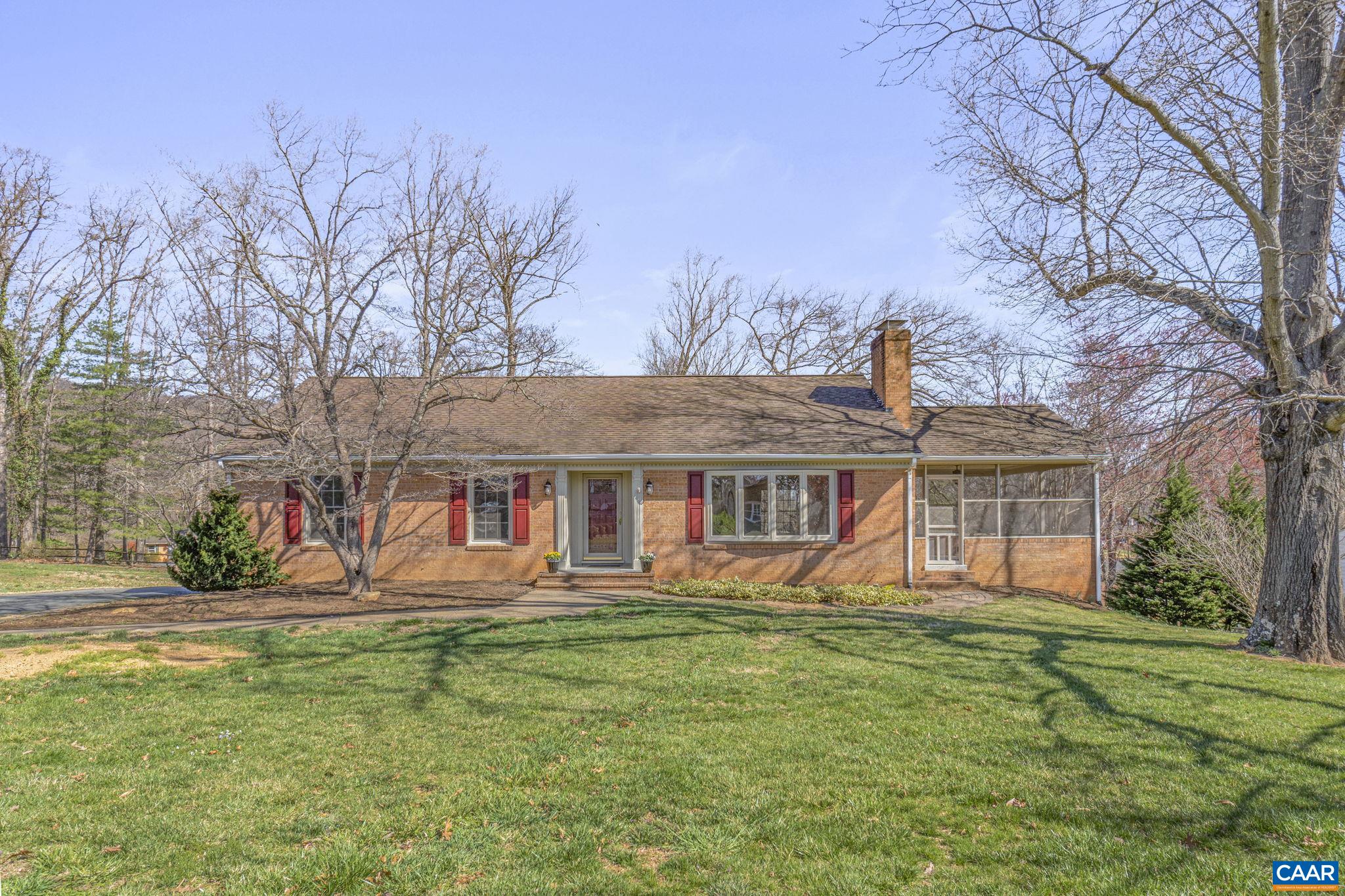 Brick residence in Laurel Hills with a partially finished full walk-out basement and walk-up attic for future expansion. This fine home features hardwood floors, two fireplaces, a large screened porch and replacement insulated windows to name a few. The home has dual heat: a heat pump & an oil furnace. Large level lawn with mature shade trees. Large detached two-car garage with workshop & drop stairs to attic space. Two sheds for additional storage. This property has it all with close proximity to Crozet Elementary and Field School.