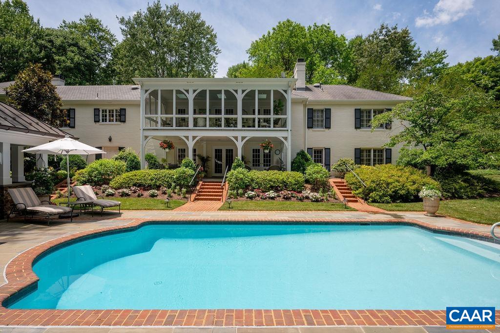 One of Farmington’s most polished & luxurious properties sited on a majestically landscaped 1.65 acres overlooking the 5th hole of Farmington’s East Course & a 5 min. drive to UVA, Farmington Country Club, Boar’s Head, shopping & restaurants. Enjoy quick access to all C'ville has to offer & return home to your private sanctuary, behind a groomed Hemlock hedge, w/ glistening pool, delightful pool house, bluestone & brick patios, level, lush lawns & blooming gardens from every view. Current owners have impeccably renovated & upgraded virtually every aspect of the home & grounds w/ masterful design, exceptional quality & timeless elegance. Easy- living floor plan includes 2 primary suites & over 4,500 square feet of gorgeous living space on the main level. The sunny, well-appointed, walk-out terrance level features 2 more ensuite bedrooms, spacious living room, kitchenette, 2nd laundry & fabulous flex space for exercise, storage & more!
