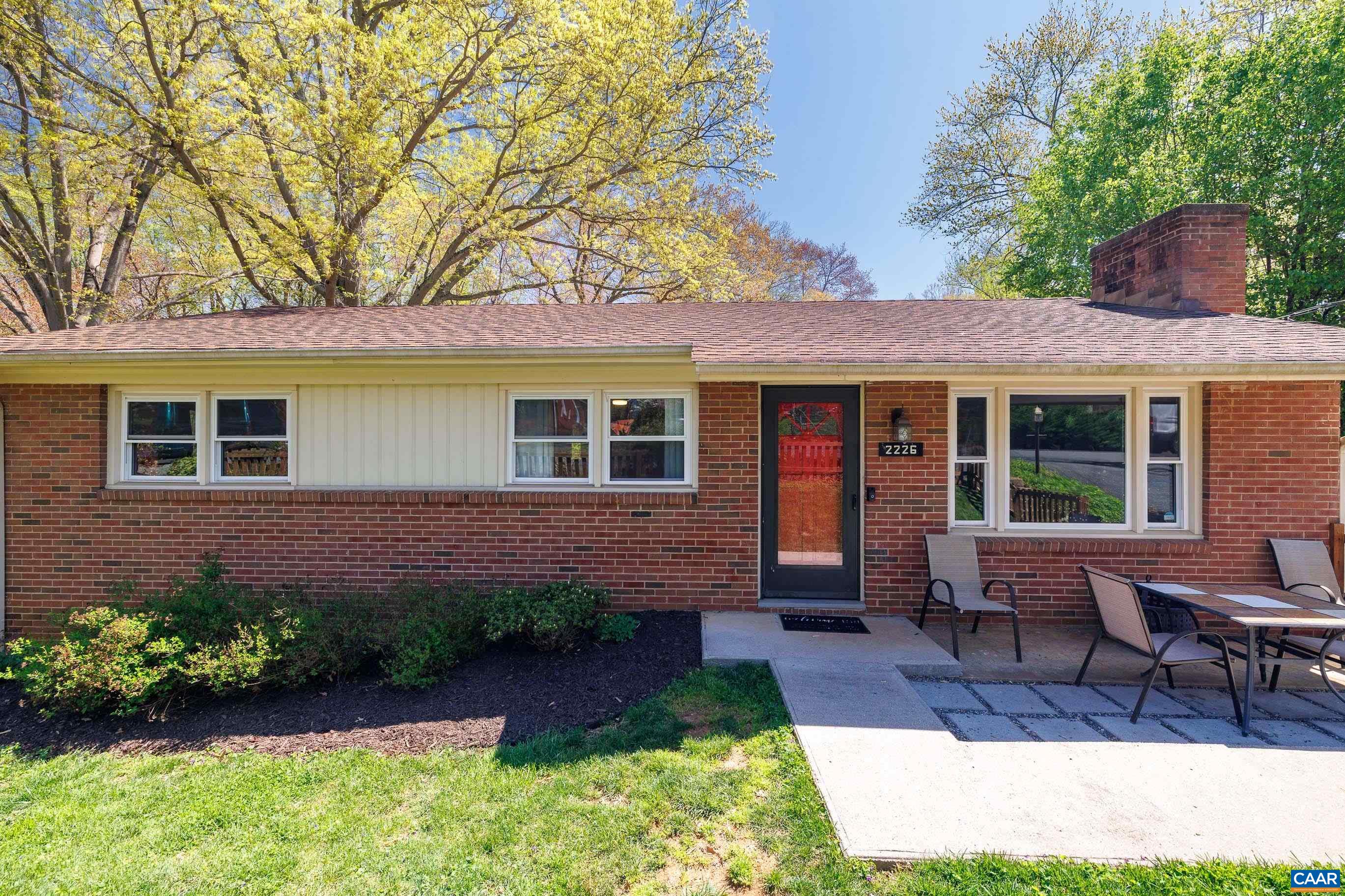 Welcome to this thoughtfully maintained 4-bedroom, 2.5-bathroom home in the centrally located Greenbrier neighborhood.  Step inside to discover original, but refinished, hardwood floors throughout the main level. The updated kitchen features sleek granite countertops, new appliances, and a generous walk-in pantry. Downstairs, a fully finished basement provides a large rec room, a full bathroom, ample storage space, and a separate entrance. The home also includes two bright and sunny bonus rooms, ideally complete with Ting Internet, for remote work, hobbies, or a quiet reading nook. All bathrooms have been thoughtfully updated with modern finishes and fixtures. Laundry hookups on both levels provide maximum convenience and flexibility. Outside, the property impresses with a large shed for storage, a fully fenced backyard, perfect for pets and outdoor gatherings, and a relaxing hot tub that conveys. Beautiful, landscaping surrounds the property, enhancing its curb appeal. Enjoy peaceful, mosquito-free evenings on the screened in porch.  Windows and HVAC replaced in 2018, and french drains added. Interior recently repainted, and front and back patios reworked in 2022.
