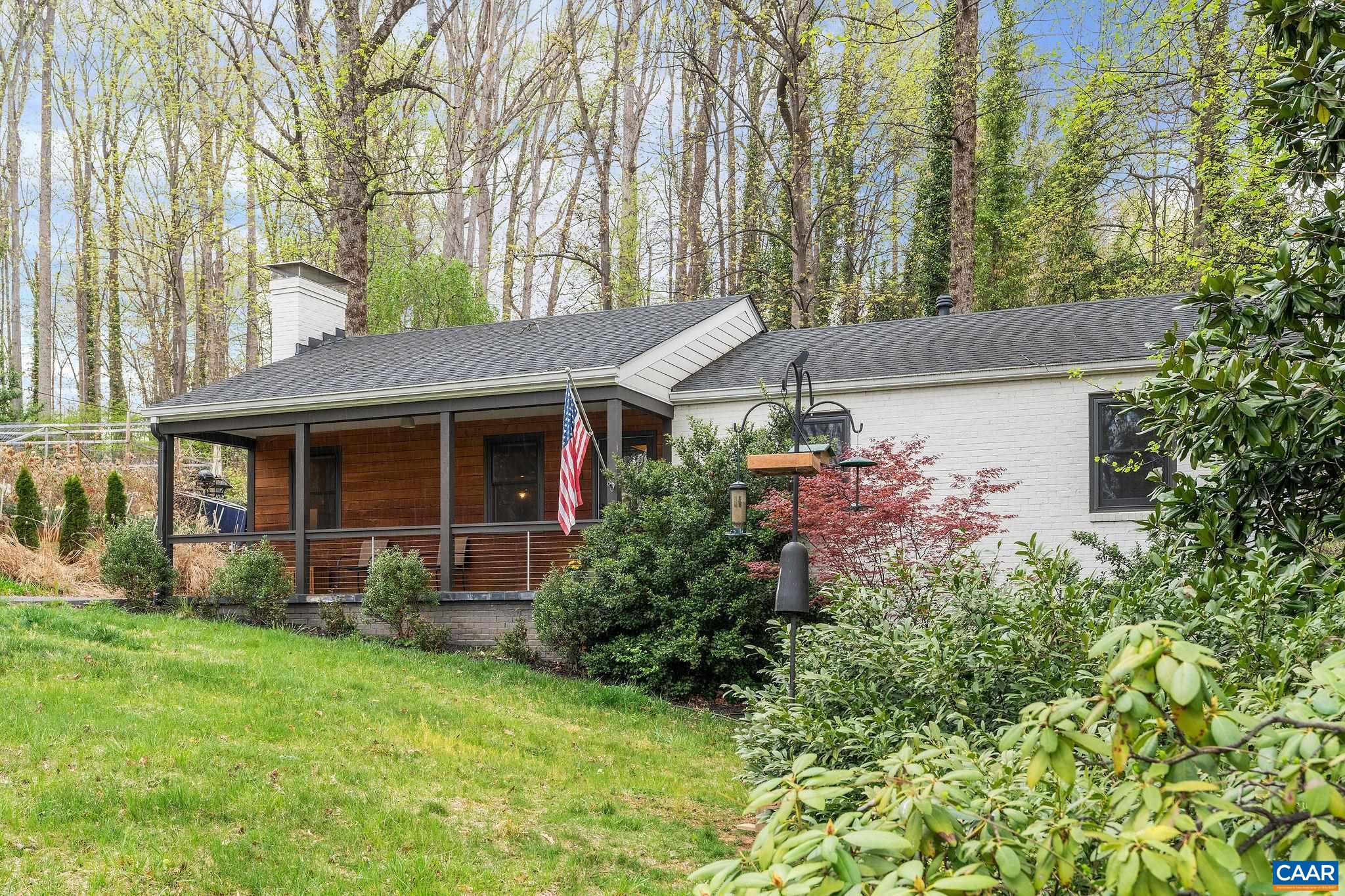This beautifully renovated brick home, nestled on a quiet cul-de-sac in the sought-after Greenbrier neighborhood, seamlessly blends quality craftsmanship with modern style. Fully transformed by the incredible HubbHouse in 2017 with meticulous attention to detail, it boasts stunning finishes, an open and functional layout, and exceptional curb appeal. The bright, stylish kitchen features Quartz countertops, stainless steel appliances, and exquisite tile work, while rich hardwood floors and two wood-burning fireplaces add warmth and character. The lower level offers a spacious, finished rec room perfect for a variety of uses. Outside, enjoy a welcoming front porch, a private back patio, and a fully fenced yard with mature landscaping and a convenient storage shed. Ideally located with quick access to UVA, the Downtown Mall, Pen Park, Greenbrier Park, the Rivanna Trail system, and an array of shops and restaurants—this home is a rare find in a prime location.