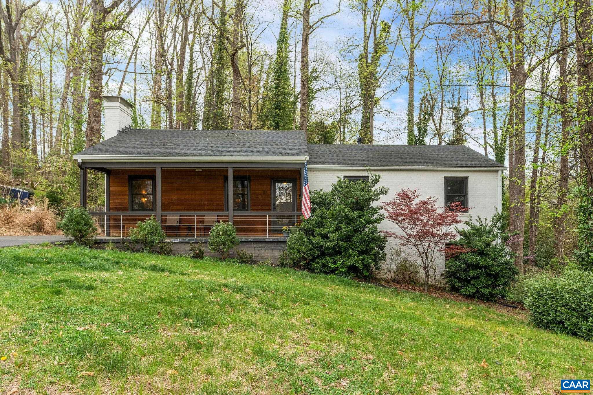 This beautifully renovated brick home, nestled on a quiet cul-de-sac in the sought-after Greenbrier neighborhood, seamlessly blends quality craftsmanship with modern style. Fully transformed by the incredible HubbHouse in 2017 with meticulous attention to detail, it boasts stunning finishes, an open and functional layout, and exceptional curb appeal. The bright, stylish kitchen features Quartz countertops, stainless steel appliances, and exquisite tile work, while rich hardwood floors and two wood-burning fireplaces add warmth and character. The lower level offers a spacious, finished rec room perfect for a variety of uses. Outside, enjoy a welcoming front porch, a private back patio, and a fully fenced yard with mature landscaping and a convenient storage shed. Ideally located with quick access to UVA, the Downtown Mall, Pen Park, Greenbrier Park, the Rivanna Trail system, and an array of shops and restaurants—this home is a rare find in a prime location.