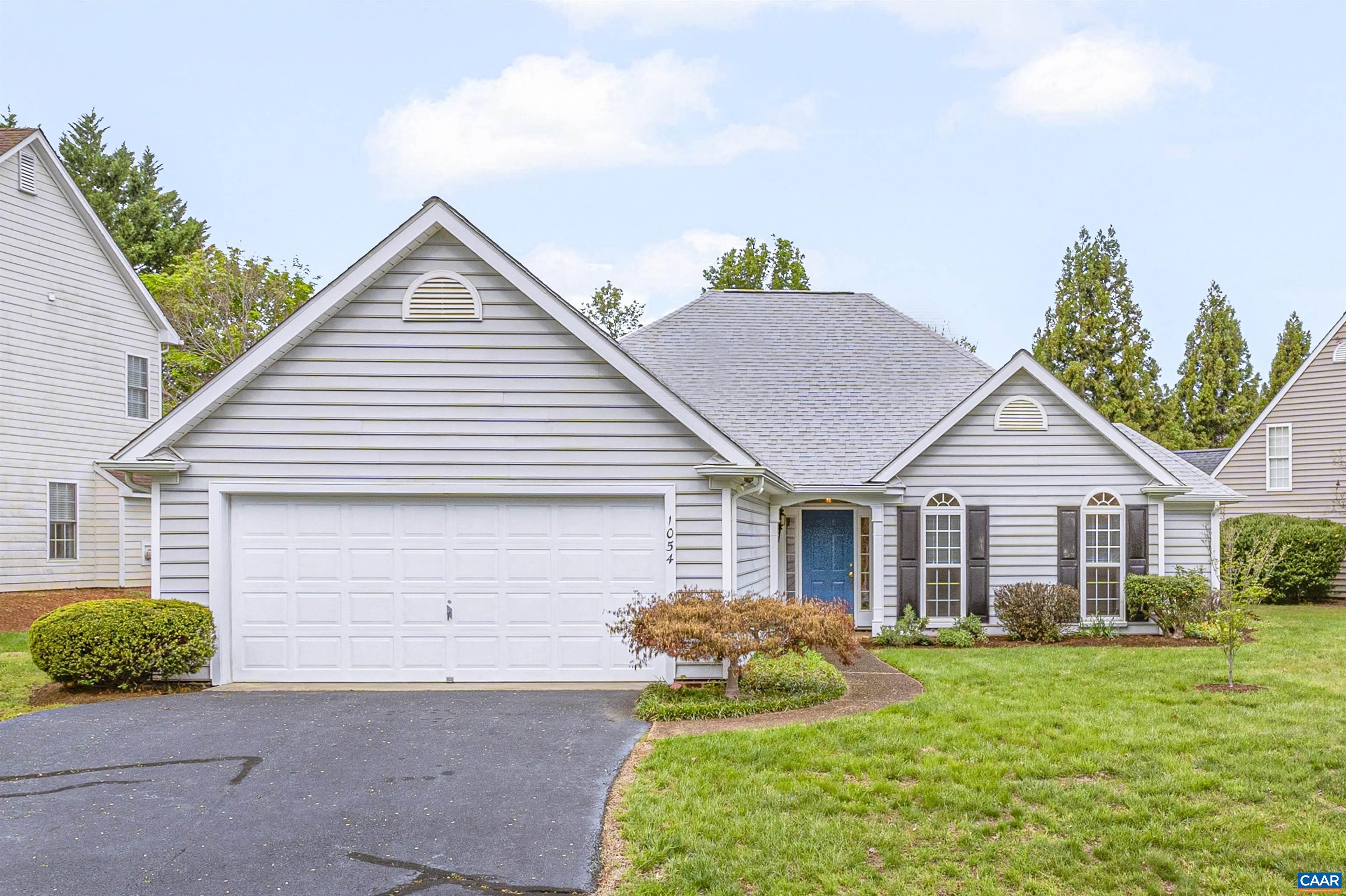 OPEN HOUSE Saturday from 12-2 PM! Welcome to this light-filled, one-level home offering timeless appeal, a functional layout, and the opportunity to make it your own in the Western Ridge community. You'll find with the vaulted-ceiling living room and family room, there’s space to spread out, relax, and enjoy the best of single-story living. Inside, you’ll find large windows throughout that bring in beautiful natural light, highlighting the hardwood and luxury vinyl plank flooring—no carpet in sight. The generously sized kitchen and main living spaces offer great bones and a flowing floor plan, ready for your personal touch and vision.  A true highlight is the sun-drenched sunroom, an ideal spot to enjoy your morning coffee or a peaceful moment with views of the vibrant backyard. Step outside into a mature, organically maintained yard where spring brings a delightful array of surprises—perennials, daffodils, blueberry bushes, and blooming David Austin roses create a living landscape that’s as beautiful as it is bountiful. Gardeners and nature lovers alike will appreciate the care and love poured into this outdoor space. This sweet neighborhood enjoys a pool, sports court, fitness gym, clubhouse, playground, mountain views and more!