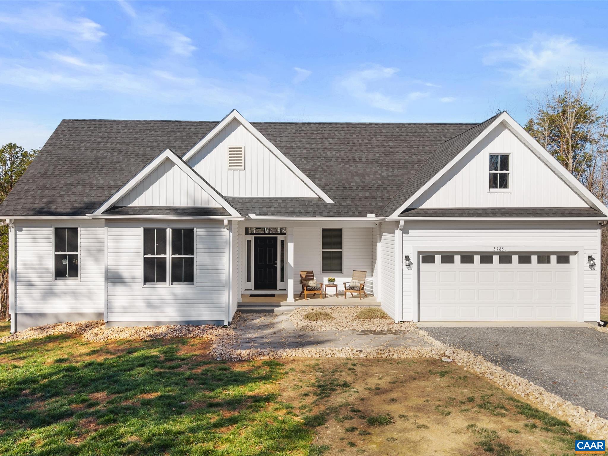 Welcome to this stunning 2021 custom built home situated on 21 acres south of Charlottesville, within a 30-minute drive to the city. This single level home with a part finished basement boasts over 2,400 square feet of finished living space along with 4 bedrooms & 3.5 bathrooms. Upon entry, you will be greeted by Mannington waterproof laminate flooring that spans most of the home. The vaulted ceiling living room houses the gas fireplace, which is fed by the 500-gallon propane tank (also for the 24kw generator). Continue into the spacious kitchen featuring granite countertops, an island with seating, walk-in pantry, dining area, and stainless-steel appliances. 3 bedrooms are located on the main living level, including the primary, which is equipped with a trey ceiling, full en-suite bathroom, and a walk-in closet. The laundry room is located beyond the kitchen with a convenient tub sink. The part finished walk-out basement includes the 4th bedroom, another full bathroom, a generously sized rec room, and an insulated unfinished area that has been used as a game room.
