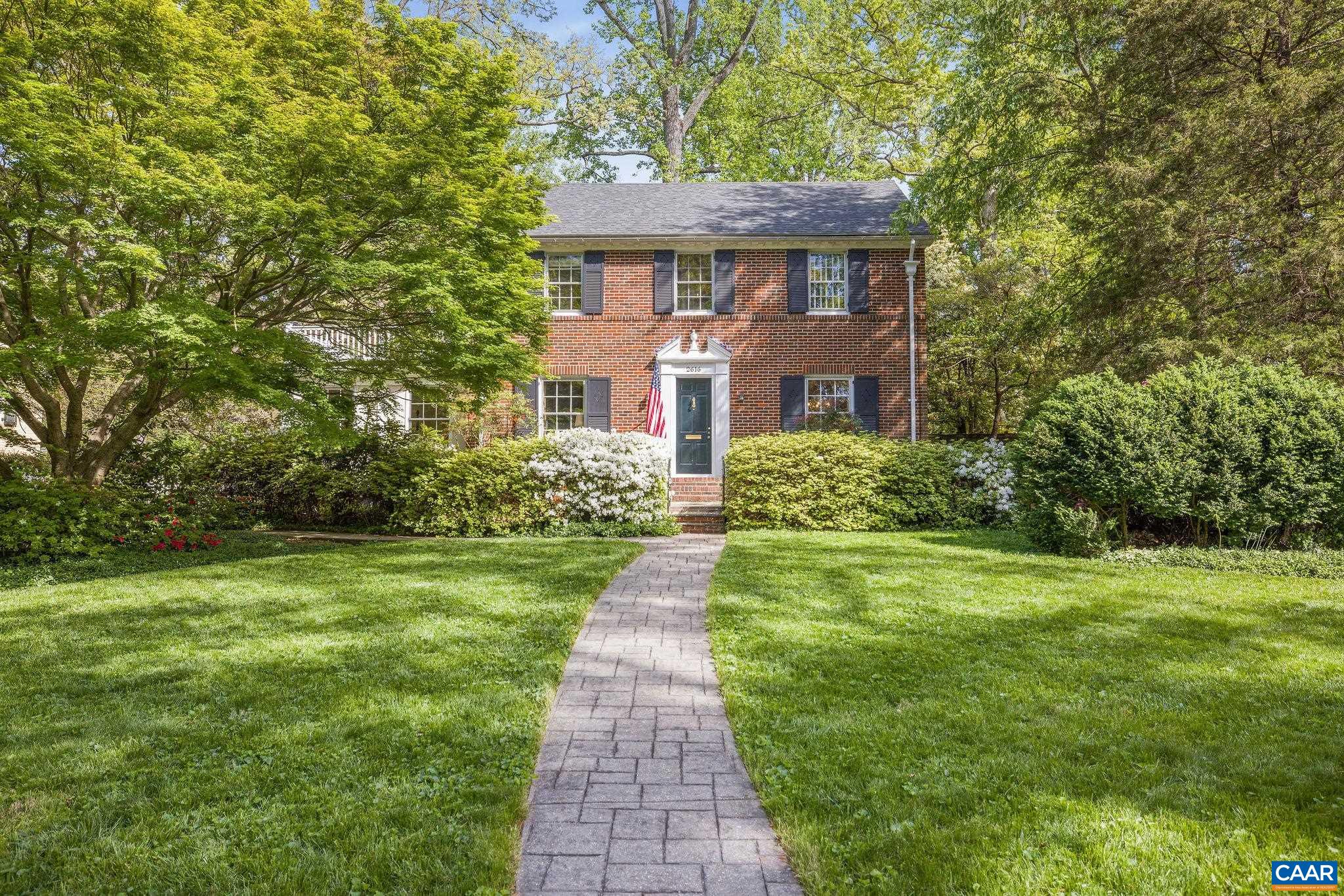 Located on a lovely street in sought-after Fry’s Spring neighborhood, this classic 2-story brick home blends timeless design with thoughtful updates and incredible outdoor beauty. A showstopper from the curb, the home is framed by blooming azaleas along the front and winding up the private driveway setting a vibrant, welcoming tone from the start. The main level offers an inviting living room with gas fireplace, a formal dining room, and a recently renovated kitchen featuring a Viking gas range. At the rear of the home, a light-filled Sun Room provides a casual living and dining area, while offering relaxed comfort and a beautiful view of the gardens. With two distinct living spaces and two dining areas on the main level - formal and informal - the layout provides flexibility for everyday living and entertaining. A main-level primary BR suite with en suite Bath rounds out the floor. Upstairs, you’ll find the original primary bedroom, two additional bedrooms, and a full Bath. The backyard is a peaceful, private retreat, complete with meandering garden paths, mature trees, and lush landscaping. Off-street parking and convenient to UVA/all things Charlottesville  - 15 minute stroll to Pi-Napo Pizza and Sbrocco's yummy coffee/donuts!