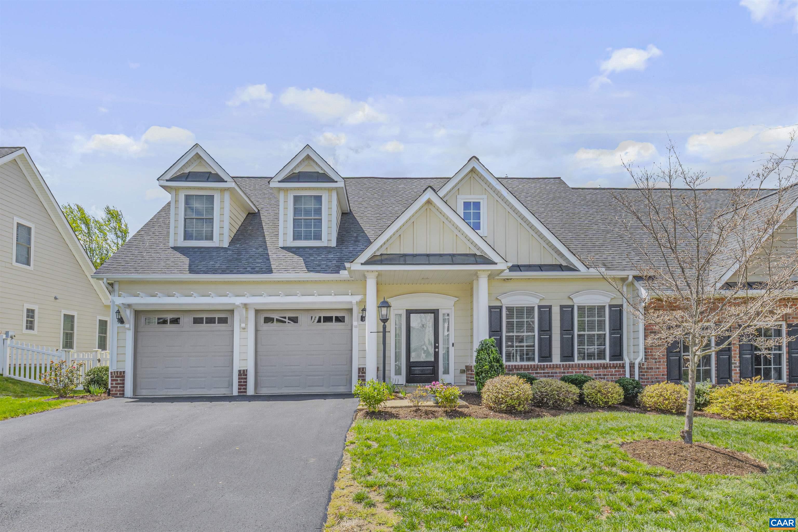 Enjoy low-maintenance, one-level living in desirable Dunlora Forest—conveniently located near major roadways, UVA, and downtown Charlottesville. This beautifully updated home offers an open-concept floor plan with vaulted ceilings in the great room, allowing for an abundance of natural light throughout the main living space. The upgraded kitchen features granite countertops, a stylish backsplash, and high-end stainless steel appliances—perfect for everyday living and entertaining. Just off the great room, a finished sunroom provides additional space to relax or host guests. The main-level primary suite is thoughtfully positioned near the laundry room for added convenience, and a dedicated office (or 4th bedroom) provides flexibility for working from home. Upstairs, you’ll find two spacious bedrooms and a full bathroom plus a utility room that provides space for additional storage. Step outside to a private, fully fenced backyard framed by mature trees—offering a peaceful retreat with space to entertain, or simply unwind.