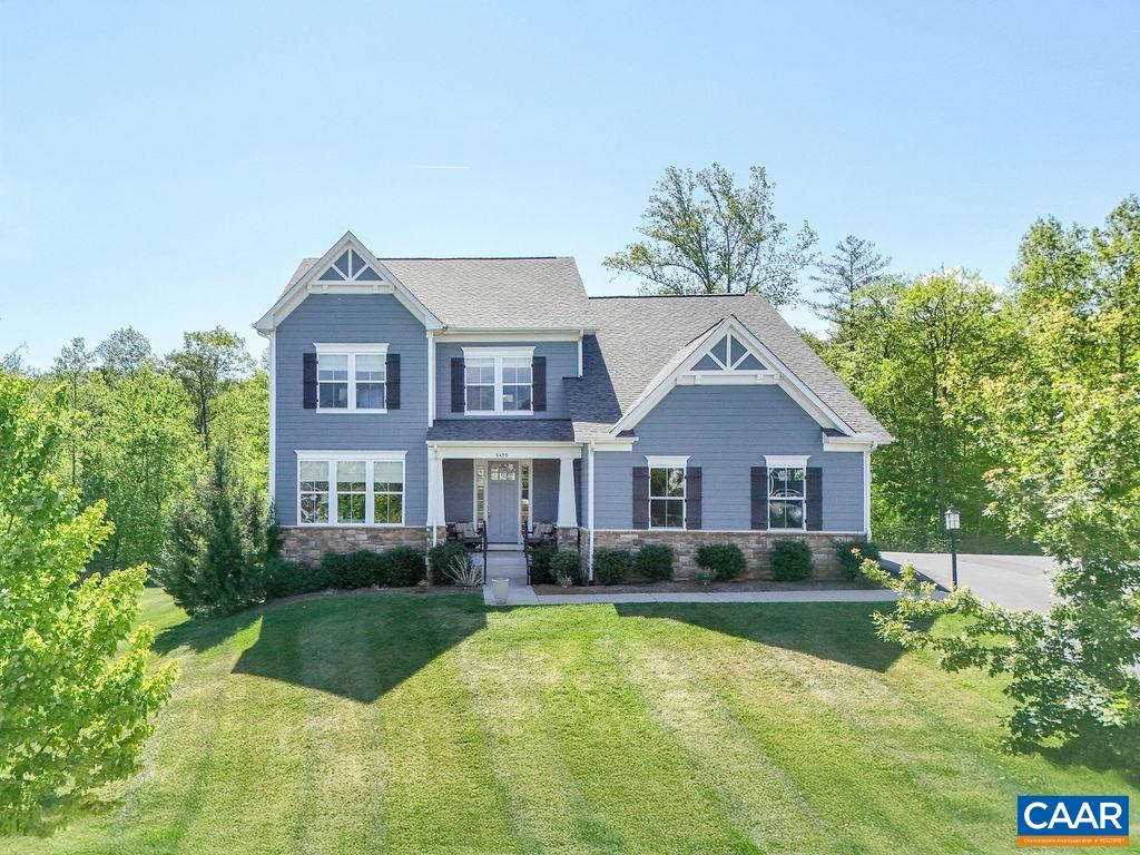 Stunning Crozet home in sought after Chesterfield Landing on Premier Lot that has direct access to Crozet Trails.  Home is nicely elevated and backs up to the wooded side of the neighborhood with great privacy and Blue Ridge Mountain Views.  Spacious 5 bedroom home with bonus main level study/office.  Open main floor includes great room with upgraded wood burning fireplace, gourmet kitchen with under cabinet lighting, and dining room over looking the backyard.  This home has many upgrades from the builder including custom large Screen Porch; Extra wide 3' doors throughout; zero clearance garage entry; High grade LVT flooring throughout including advantech subflooring; Lumin Smart panel. Several energy-efficient features including Solar Panels located on back of the house (very low electric bills); Whole house air filter; LP TechShield Radiant Heat roof sheathing and Tankless hot water heater. Over 1800 square feet of unfinished basement with rough-in plumbing for additional bathroom.   Homes in this neighborhood rarely come on the market.  Come see this gorgeous Crozet home with privacy and convenience!