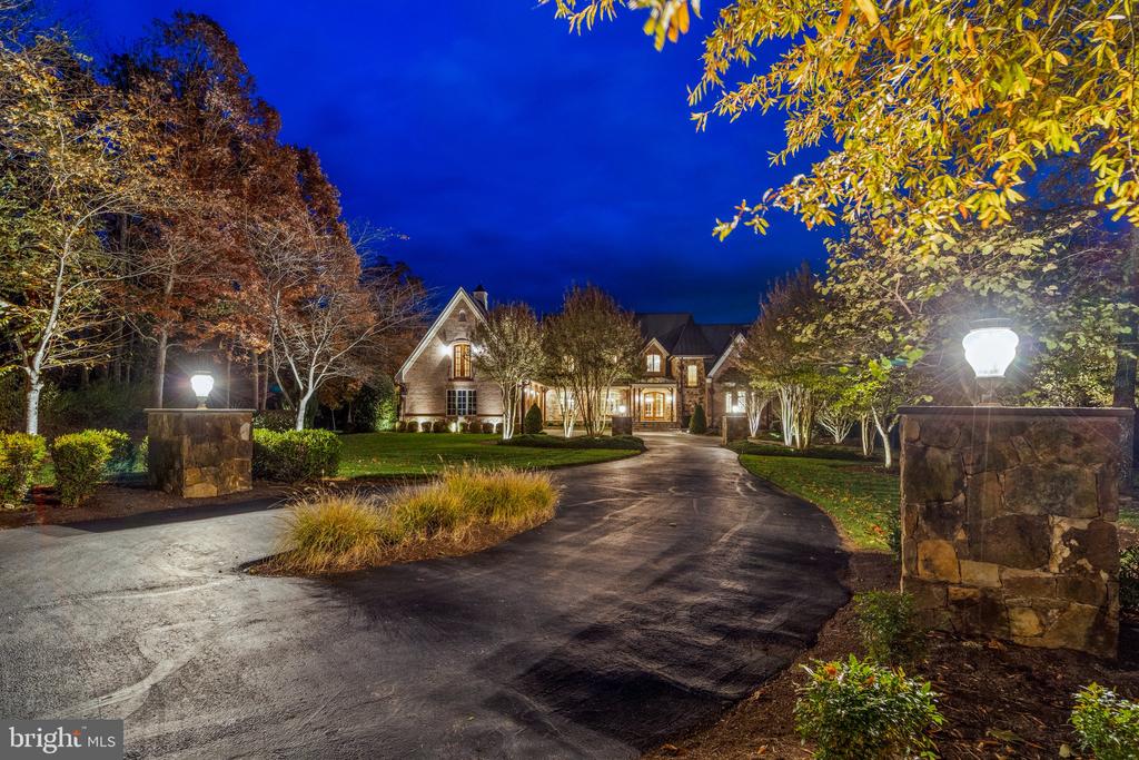 Experience resort living in the heart of Virginia's wine country. Villa di BellaVista is nestled in the prestigious Keswick Estates. Priced at an exceptional value of $3.7 million, down from its original $4.2 million, this property offers unparalleled sophistication at just $329 per square foot, well below the current community average of $419 a square foot. Property Highlights: Luxurious Design & Ample Space: This residence boasts exquisite design and architectural mastery, promising space, comfort, and timeless elegance in every detail. Premium Lot at an Exceptional Value: Experience the ultimate in scenic beauty at Villa di BellaVista's premium lot. This private sanctuary offers serene landscapes, water frontage, and sweeping views of the prestigious Pete Dye golf course. Enjoy picturesque lush green mountain tops while relaxing around the hardscaped fire ring. To the right you will find captivating views of the meticulously manicured golf course. This exceptional property promises a breathtaking backdrop for leisurely days and a truly luxurious living experience. All priced below the community average based on square footage. Efficiency, Low Maintenance, & Security: The gated community offers privacy for all its residents. Vil