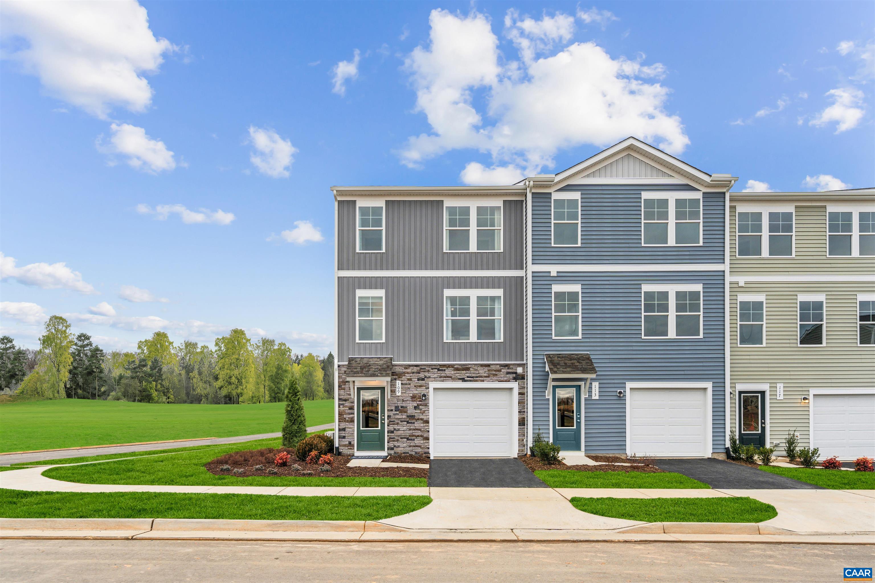 Welcome to the Piper at Colonial Circle. Looking for your first home purchase or planning to downsize? The affordable Piper townhome offers the perfect balance of style, comfort and convenience. Designed with you in mind, this 4-bedroom, 3.5 bath end home boasts three levels of bright, open living space that's perfect for hanging out with family or hosting friends. The Piper has a flexible entry-level bedroom accessible to your rear yard making it easy to adapt the space to your needs. Not looking for a 4th bedroom, you can make it a home office, gym, or extra entertaining space. The large open concept main level features a spacious living room, modern kitchen with GE appliances, quartz countertops, a large center island, and dining area fit for large dinner parties. Step out on to your spacious deck - a perfect spot for your morning coffee or a quiet evening outdoors. A 1-car front entry garage provides convenience and additional storage. Upstairs, you'll love the generously sized bedrooms, including a primary suite with en-suite bath with quartz countertops and huge walk-in closet. Plus, the top floor includes bedroom level laundry for easy access. *Photos of a similar model