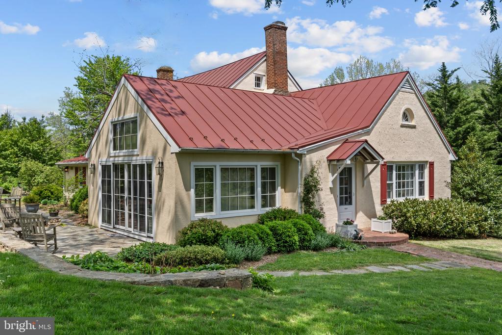 This jewel box is a real Rappahannock Treasure with everything you could dream of in a country property. The Cottage on Ben Venue Road is a restored historic home with old stone walls, delightful outdoor gathering spaces, screened porch, private pool, lovely landscaping, ideal location and a king's ransom of charm. It has three bedrooms, two and a half bathrooms, a fantastic country kitchen, large living room, ground floor primary suite and 21+/- idyllic acres in two separate lots, a strong stream and magnificent views from the higher hills. Tucked away on a designated scenic by-way, The Cottage on Ben Venue Road is private yet convenient to Flint Hill and Little Washington.