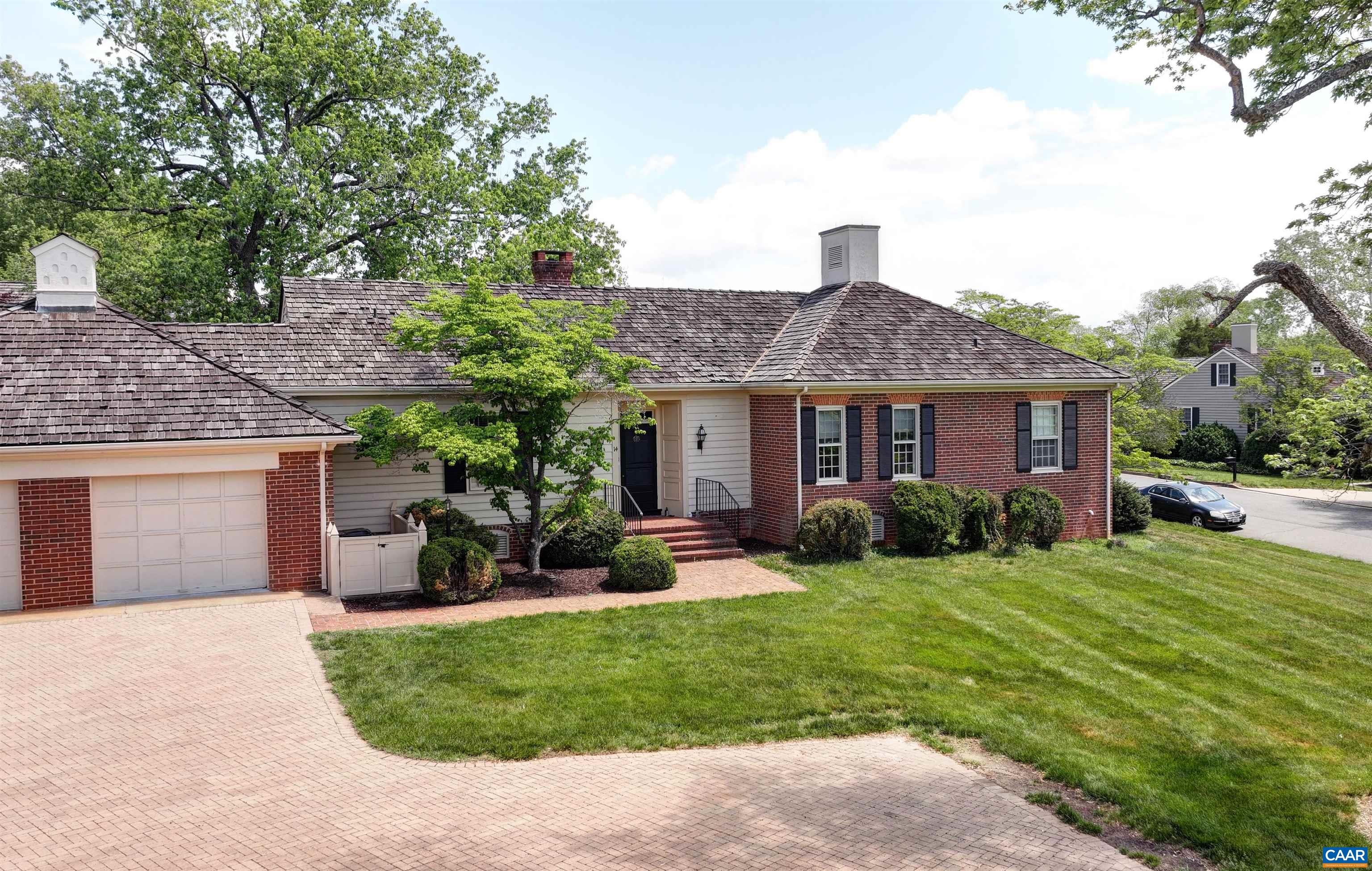 EDNAM VILLAGE - Rare opportunity for gracious, low maintenance living in one of Charlottesville's premier communities.  This beautifully designed, one level home, offers an ideal lay-out with thoughtful flow. The residence combines comfort and elegance in a highly sought-after location. Step into a welcoming foyer that opens to a spacious living room featuring a fireplace. The adjacent dining room connects seamlessly to the kitchen and a half bath, a sun room and bonus room. Both spaces are perfect for a home office, studio or just relaxing. A library/TV room with custom built-in shelves and cabinetry offers additional flexible living space. A generous primary suite includes a private bath, while a second bedroom also features a full bath, providing privacy and comfort for guests or family. Additional highlights include a conveniently located washer and dryer, a one-car garage with storage and a large lot for the area. Easy walking to all the amenities of the Boars Head Resort Complex or take a short drive to the University of Virginia and all the best of Charlottesville.