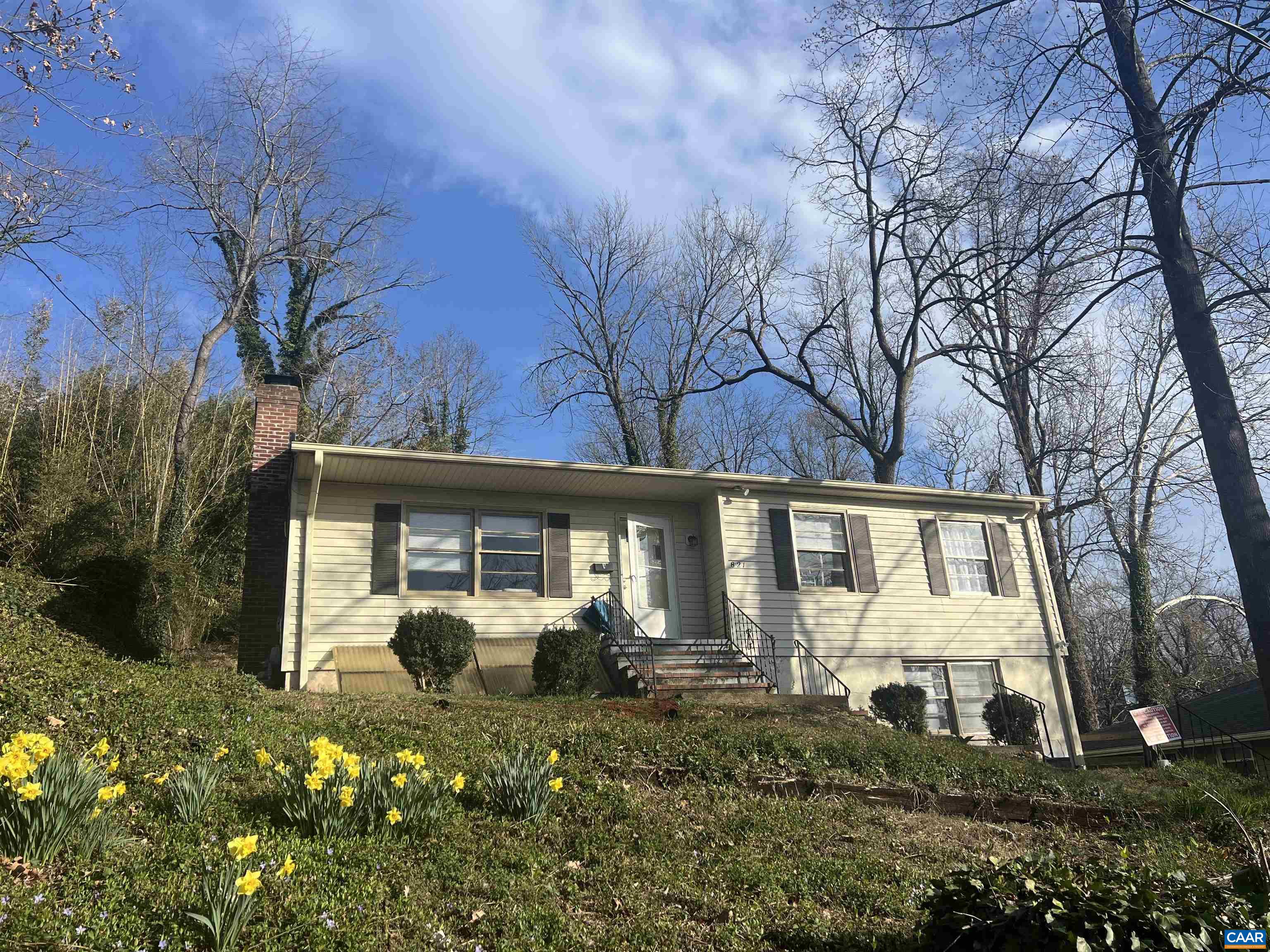 Great home on an elevated lot close to UVA...Currently rented through May 2026...Bright and cheerful, large living and dining rooms, kitchen, hardwood floors, 3 bedrooms, 2 baths  upstairs... Living room, bedroom, bath, and kitchen with LVP on terrace level