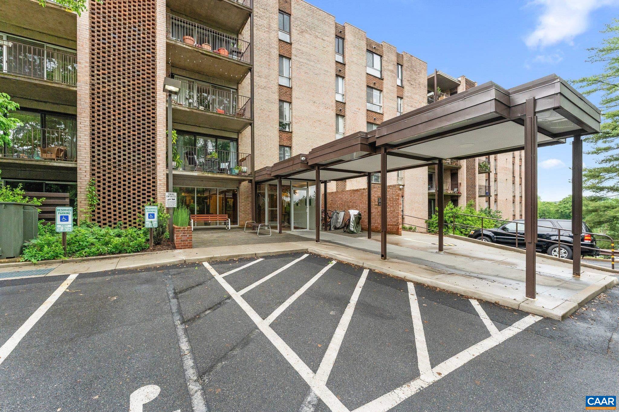 This light-filled, top floor condo in Charlottesville Towers offers a perfect blend of urban convenience and peaceful retreat.  The spacious living area is bathed in natural light, with sliding glass doors that open to the balcony and showcase the view from nearly every angle. Elegant built-ins with glass-front cabinets add a touch of sophistication to the living and dining spaces, while rich wood floors lead the way down the hall to the bedroom.  The bedroom features two generous closets for abundant storage, and the kitchen with stainless appliances, is awaiting your culinary creativity.  With a fresh, modern feel throughout, this home is ideal for anyone seeking carefree city living just steps from everything downtown Charlottesville has to offer.
