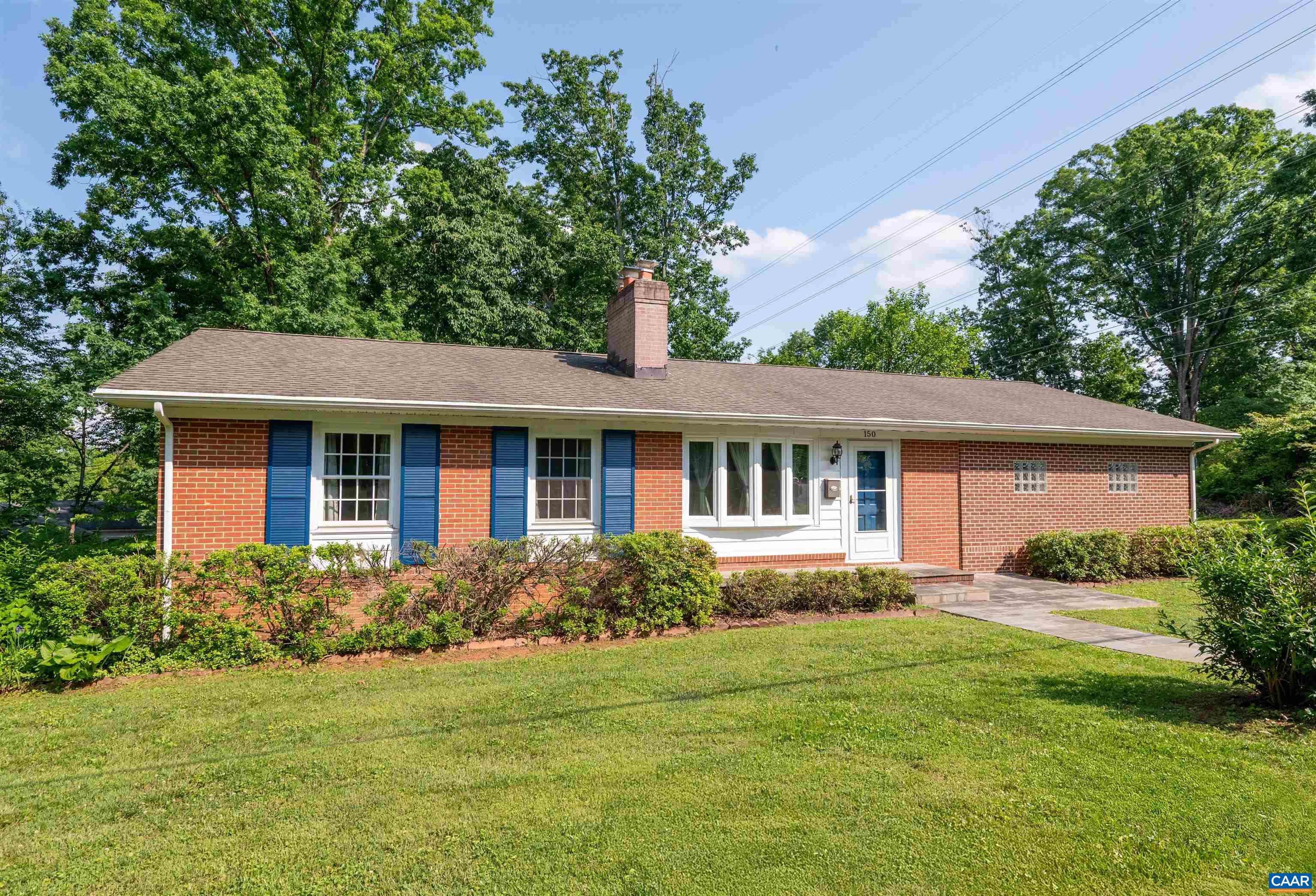 Welcome to this charming, well-maintained brick ranch on a desirable corner lot minutes from UVA, the Law School, downtown, and local shops. This spacious 4BR/3BA home blends timeless appeal with thoughtful updates. Enjoy sun-filled living spaces with hardwood floors, a wood-burning fireplace in the living room, and a second in the large family room. The main level features a primary suite and spacious secondary bedrooms, while the finished lower level offers flexible space for guests, work, or play. Recent updates include a new HVAC system, enclosed garage and sunroom, granite kitchen counters/flooring, basement renovation with full bath, and all new basement doors/windows with granite sills. More recent improvements: Anderson Windows, bluestone walkway, porcelain tile in basement, granite tile in sunroom, new shed, appliances, and storm door. Fully fenced yard, and the mounted TV in the sunroom conveys. Classic style in a prime location!