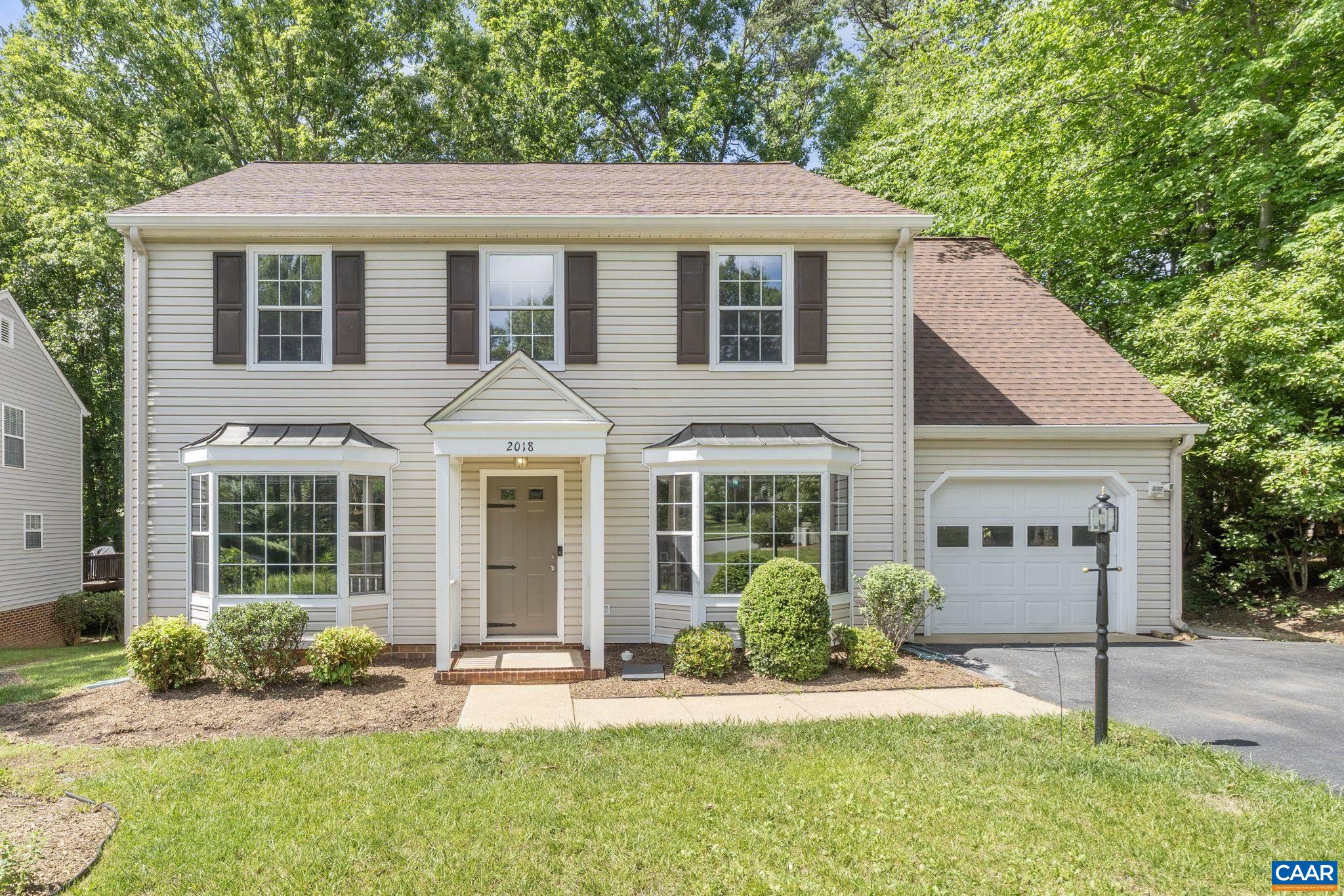 COMING SOON!  Welcome to this charming 4-bedroom, 2.5-bath Colonial located in the amenity-rich community of Forest Lakes! One of the areas most desirable neighborhoods. Beautifully updated throughout, this home perfectly blends comfort and style.  The updated kitchen features white cabinetry, quartz countertops, a central island for meal prep, and stainless steel appliances—ideal for the home chef. Adjacent to the kitchen, the spacious family room offers a cozy masonry wood-burning fireplace, perfect for relaxing evenings. Luxury vinyl plank flooring runs throughout the home, providing both elegance and durability. The upper-level primary suite is a true retreat, featuring a fully renovated ensuite bath with a double vanity and modern finishes. Separate dining and formal living areas. Enjoy outdoor living on the expansive multi-level Trex deck with a pergola—ideal for entertaining or relaxing with privacy. Additional features include a one-car garage and access to Forest Lakes' many community amenities, including pools, trails, and tennis courts.  Storage shed