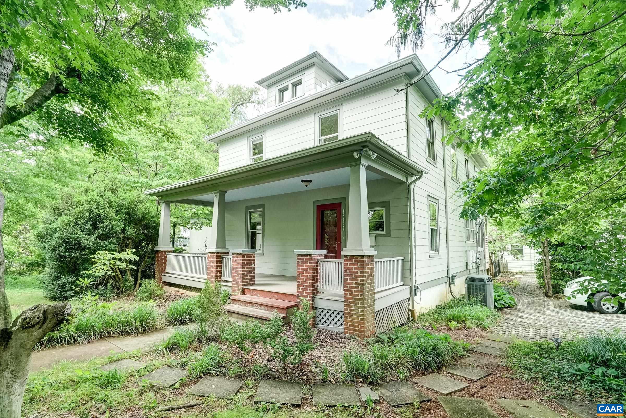 Beautiful downtown home with stunning addition (2020), detached, income generating cottage, and detached 2-car garage with studio/office space in the charming Frys Spring neighborhood of Charlottesville.  Located on 1+ acre with lush landscaping providing privacy and year-round color, garden space and off street parking! Solar panels provide 100% of electricity depending on the season. This unique custom home features original hardwood floors throughout the main house, with a large living room that opens to the formal dining room.  The newly added kitchen features quartz countertops, white cabinets, stainless steel appliances and an eat-in breakfast nook.  Main level living with the expansive light-filled primary suite that features a luxurious spa-like bathroom,  walk in closet and screened porch access.  Upstairs three generously sized bedrooms share a full hall bathroom, and a fourth bedroom could be converted from a built-in closet back to a fifth bedroom if desired. The detached  2-car garage features a ground floor office/workout space, half bathroom and loft area, and the income-generating 2 bedroom cottage features. a kitchenette, full bathroom and living room.  This home is a must-see in the heart of town!