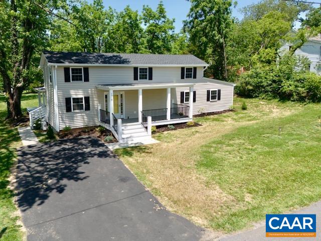 Enjoy mountain views while relaxing on back deck or sitting by firepit. Located in the heart of Crozet, this fully renovated farmhouse blends modern style with timeless charm. Everything is brand new—from the systems to the finishes—offering worry-free living. The open floorplan connects the main living areas, ideal for entertaining or relaxing. TWO spacious PRIMARY en-suites are located on the MAIN level, with two additional bedrooms upstairs. All bathrooms feature stunning ceramic tile work for a luxurious touch. A conditioned crawl space and a tankless water heater add to the home’s efficiency and comfort. Sitting on a level half-acre lot, the property boasts generous deck space, perfect for enjoying the outdoors. Nice LEVEL YARD.  Walk to Crozet’s popular dining spots and coffee shops, or take a quick drive to local wineries and breweries. Just 15 minutes from Barracks Road Shopping Center and UVA, this home offers unbeatable convenience and value in desirable Albemarle County.