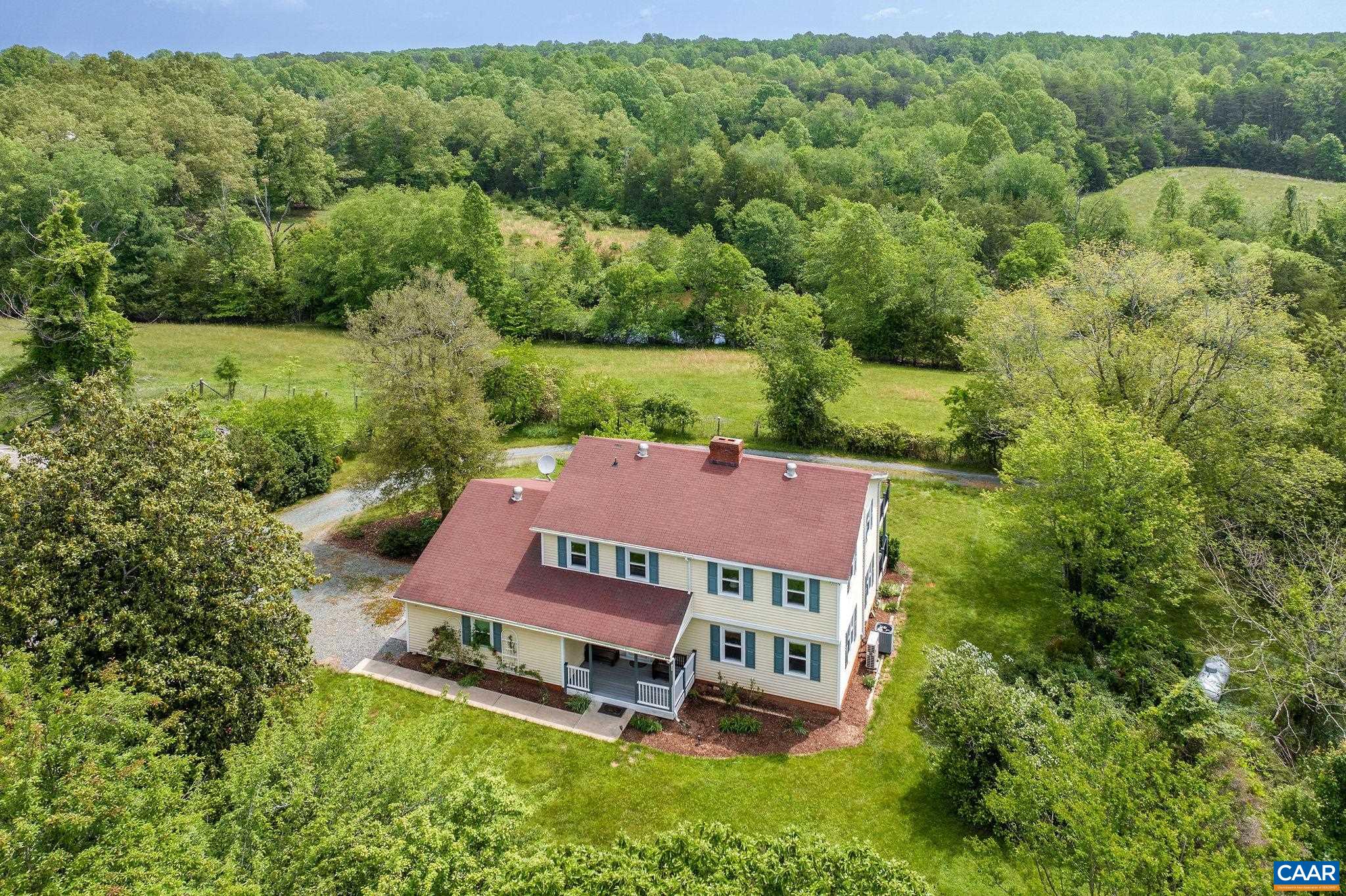 Enjoy the Virginia Country lifestyle. 66.52 acre farm in the greater Keswick area offers privacy, natural beauty and versatility. Perfect for horses, cattle or other animals. It is a scenic blend of open pasture and wooded acreage. The completely renovated 3-4 bedroom home features an open concept floorplan with new LVP and ceramic tile flooring, a gorgeous kitchen with marble counters, brand new appliances, pendant lights, and a breakfast bar. There are 2.5 totally remodeled baths with beautiful tile work and a rainfall shower in the primary bath. Fresh interior paint gives the home a bright modern feel. Step outside to take in the peaceful views from two new double decks and relax on the front porch, all built with low maintenance Trex decking. Recent updates include a new heatpump and minisplit system for year round comfort. Don't miss the complete list of improvements available in documents. A rare opportunity to own a turn key farm property in one of Central Virginia's scenic locations.