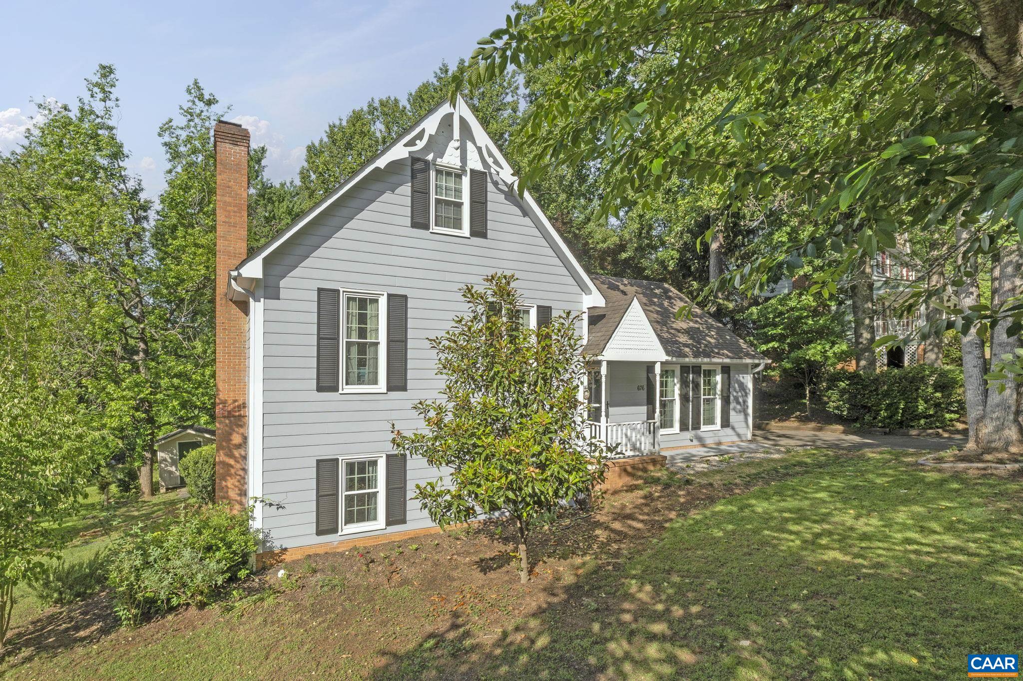 Welcome to Village Square, where convenience meets comfort in the heart of Charlottesville—just minutes from parks, shopping, schools, and top dining spots. This delightful home features an open-concept living and dining area, flowing into an updated kitchen with views of the spacious backyard and full-width deck—ideal for entertaining or relaxing. Upstairs offers a primary suite, two additional bedrooms, and a full bath. The versatile lower level includes a bedroom, bathroom, laundry, family room, kitchenette, and walkout access—perfect for an in-law suite or guest space. Don’t miss this well-located, flexible home—schedule your private showing today!