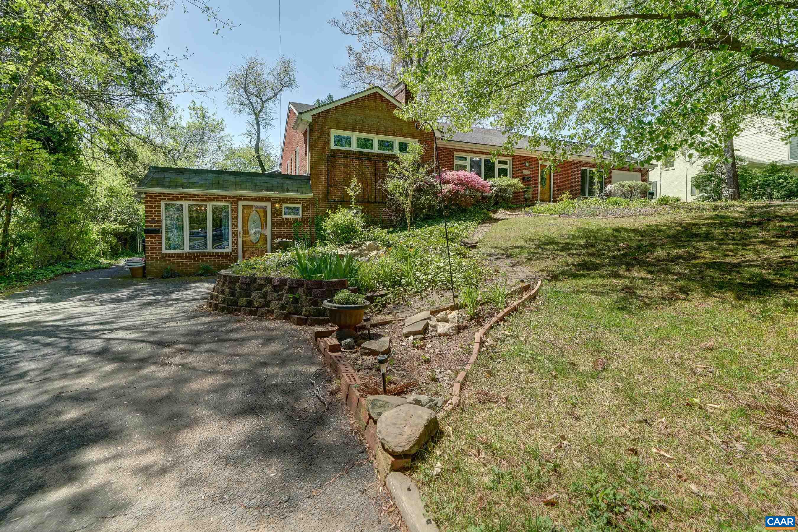 Great value with lots of possibilities!  Wonderful brick ranch home with main level living and potential income-gnerating basement apartment. Walk to Marie Bette, Dairy Market and more! Spacious fenced rear yard on quiet street in the desirable heart of Charlottesviile, Rugby area. Walk to McIntire Park, downtown restaurants and shopping and the Rivanna Trail.  Main level features hardwood floors, living room with brick fireplace, dining room and three bedrooms. Finished lower level features a flex room with full bathroom, laundry and multiple storage rooms. Basement features a large open dining/living space with eat-in kitchen and carpeted bedroom with full bathroom. Currently being rented as two different units. Unit A rents for $2200/mo and lease ends 11/30. Unit B rents for $1500/mo and lease ends 11/30.Purchaser agrees to participate in a 1031 Exchange at no expense to purchaser.