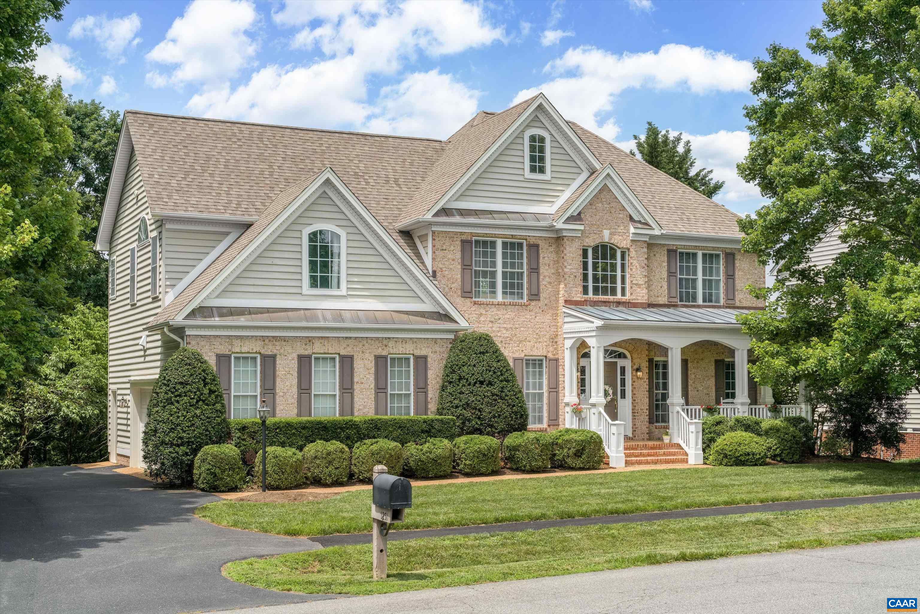BEAUTIFULLY UPDATED HOME IN STILL MEADOW ON EXCEPTIONAL LOT! Nestled in a peaceful, tree-filled setting, this spacious home offers almost 3,700 sq ft of stylish living space in one of Charlottesville’s most desirable neighborhoods. The remodeled kitchen features quartz countertops, stainless appliances, updated cabinetry, a center island, and a breakfast nook. Enjoy the light-filled two-story great room with soaring ceilings and hardwood floors that extend throughout the main level and upstairs. The luxurious primary suite includes a walk-in closet, dual vanities, and a jacuzzi tub. A finished walk-out basement adds flexible space with a custom bar, ideal for entertaining. Architectural details like transom windows, crown molding, and chair rails add charm and sophistication. Additional features include a dedicated home office or flex space, attached 2-car garage, and a large rear deck overlooking a landscaped backyard. Enjoy easy walks to the neighborhood pool and playground, plus convenient access to parks, shopping, dining, and major commuter routes. This move-in ready home offers comfort, space, and an unbeatable location!