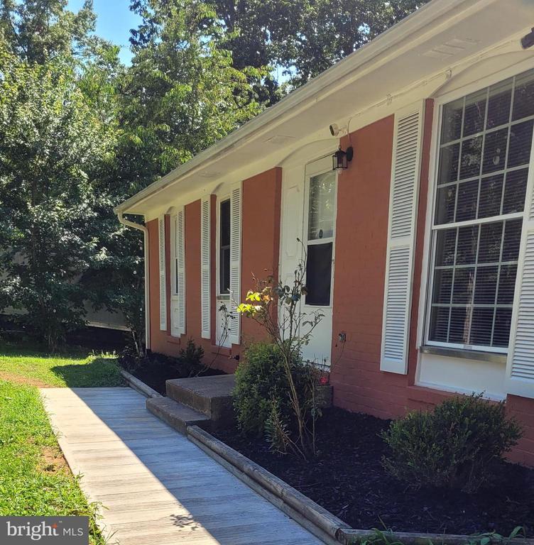 Price Improved! This unique rambler with a full finished basement has an updated kitchen with appliances less than 3 years old, all stainless steel. Front brick was just painted. Great driveway in front of the house with at least enough space for 8 cars with possibility of more. The basement is fully finished with a laundry area with a 2-year-old washer and dryer. Two bedrooms and a full bathroom. Two walkout entrances. One of them with a new double French door. It has a great clear backyard. A shed, 25 ft x 20ft, well built, only missing the siding. 20 minutes to Charlottesville, UVA, UVA Health and I-64.