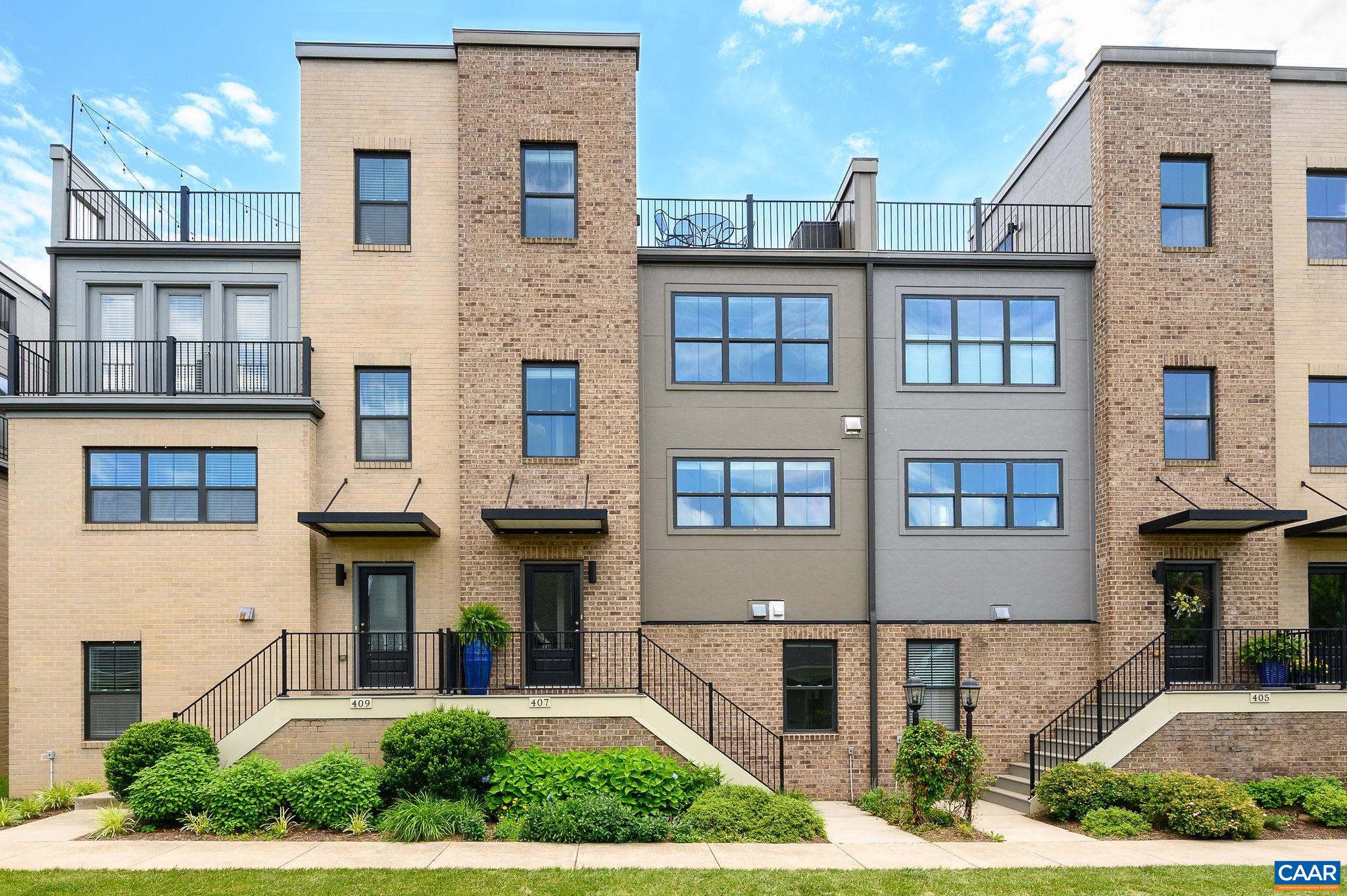 Don't miss the breathtaking mountain views from this exceptional four-story townhome in the heart of Old Trail. Located in an established section fronting a peaceful park with no through traffic, this home offers unmatched value and privacy. The flexible dual-suite layout features three bedrooms, each with its own private ensuite bathroom - a rare find in townhomes - offering comfort and versatility for guests or multi-generational living. Hardwood flooring runs throughout the main living areas, complemented by upgraded finishes and a new heat pump condenser. The highlight of the home is the spectacular rooftop deck - your private mountain retreat with sweeping views of the Blue Ridge Mountains and Shenandoah National Park, perfect for morning coffee or evening cocktails. Additional features include a two-car garage, a rear Trex deck ideal for grilling, and energy-efficient construction with a HERS score of 67 to help keep utility costs low. Just a short stroll to shops, dining, the community pool, golf course, and walking trails - move in today and enjoy the best of Old Trail Village at an exceptional value.