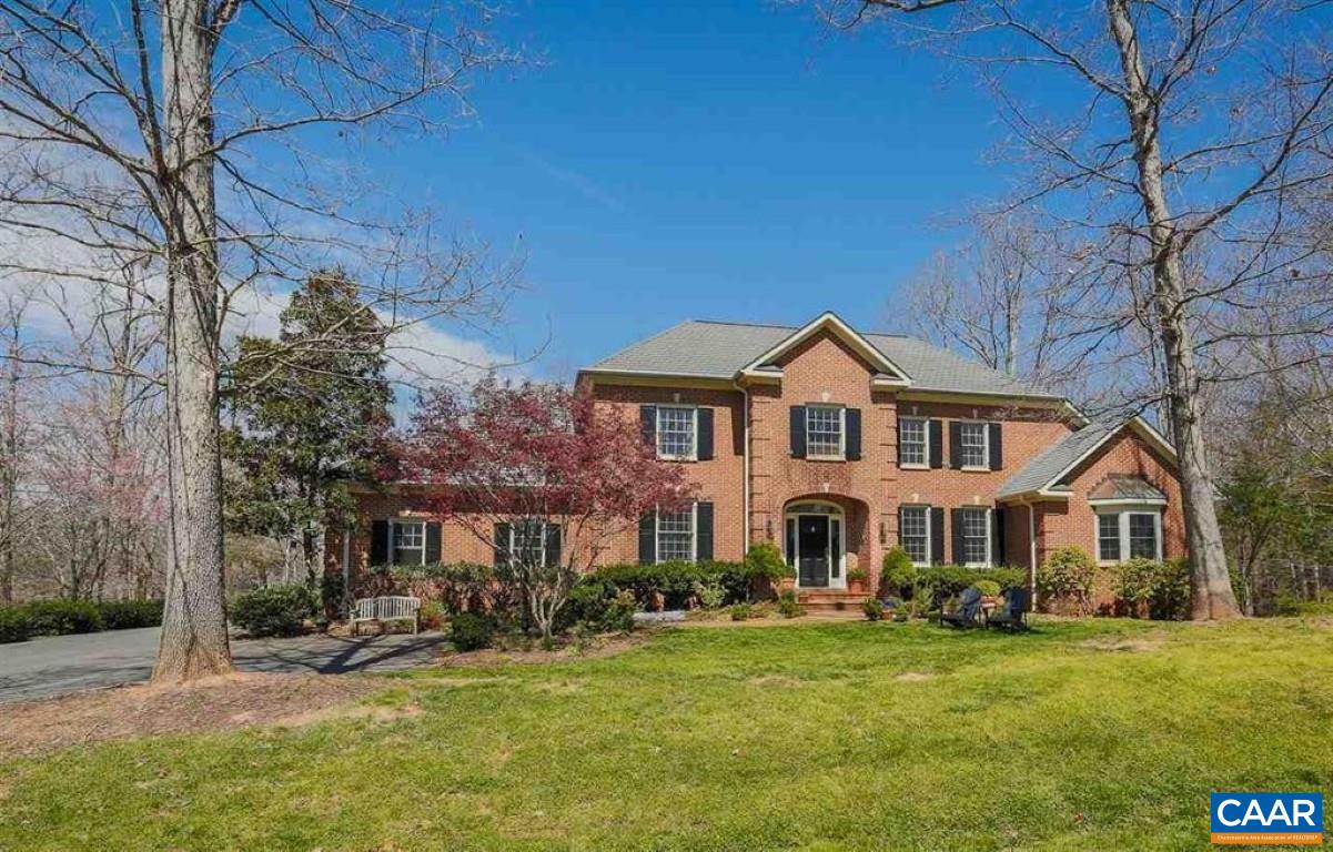 Privately situated, this stately all brick architecturally designed home on almost 3/4th of an acre, within walking distance of the clubhouse, tennis courts, pool and fitness center is now available. Conveniently located off the living room is the impressive library/study, custom built with floor to ceiling cherry cabinets/bookcases and flooring. The large sunny first floor primary suite is accompanied by a stunning primary bathroom. The Great open kitchen and family room includes a vaulted ceiling, cozy fireplace, large, oversized island and granite counter tops, Thermador gas cooktop and more. In the full finished terrace level is a convenient guest suite. Two walk-in attics, large two car garage and beautiful deck are just some of the attributes that contribute to everything that makes this house a beautiful home with great entertainment possibilities.