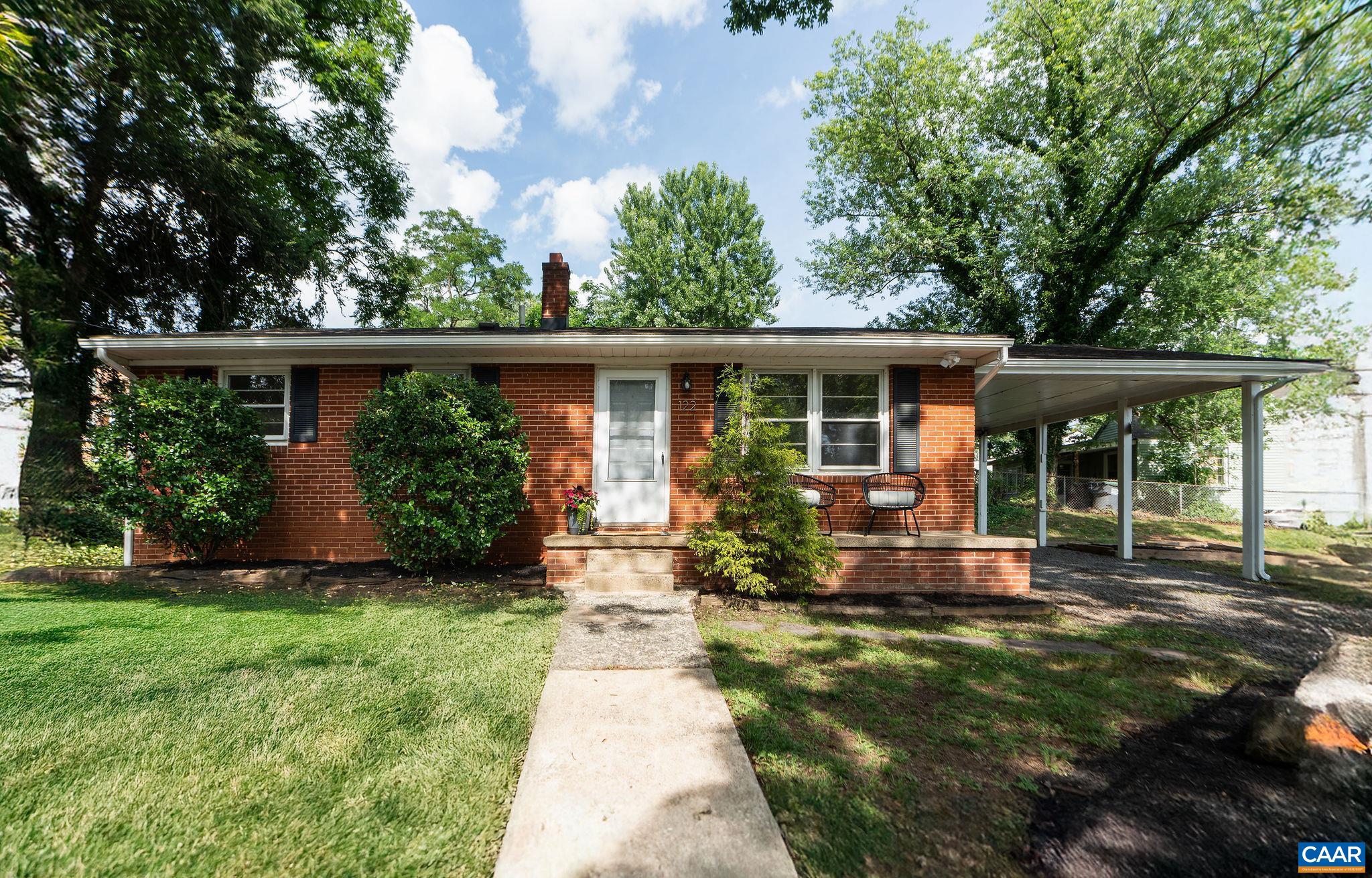 Classic brick ranch walkable to UVA on oversized corner lot. Ideal for adding more units in the future. Renovated eat in kitchen, three bedrooms,  full bath, and living room all on the main level. Hardwood floors throughout living and bedrooms. Unfinished walkout basement has been waterproofed and is ready for you to customize the property to your needs. Fully fenced. Off street parking and carport. Invest in a growing area near University of Virginia with quick access to I64.