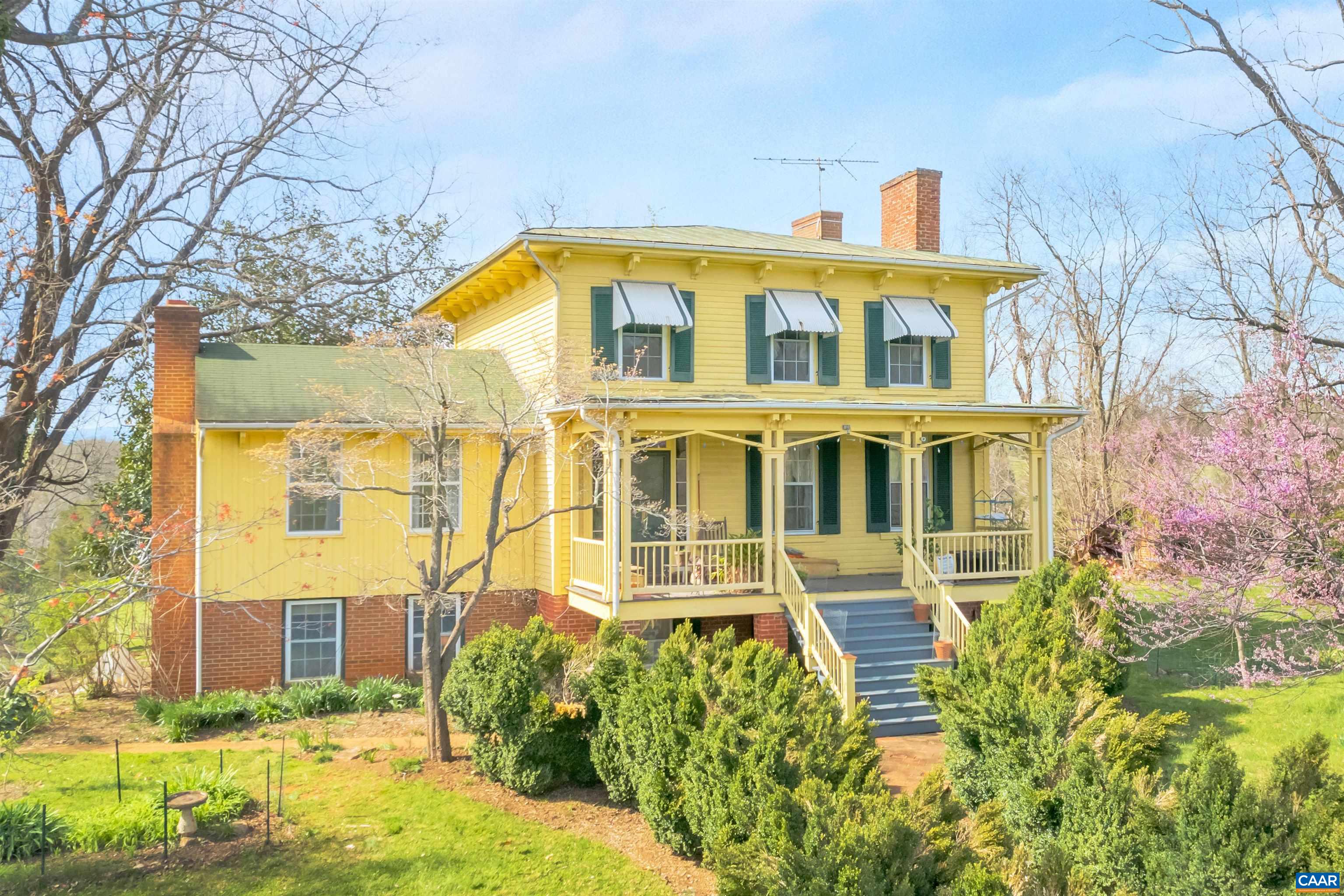 Escape to Virginia's Piedmont, the Madison-Barbour Historic District & live in Orange County horse country.  294 acres of pasture & timber (protected by Virginia Outdoors Foundation easements) surround our 1850's Italianate 4 bedroom home w/ few modifications (ready for a new owner to personalize).  The front & rear porch views of the lawn/gardens, pasture, woods & mountains remain breathtaking.  The English basement opens to a patio garden w/ Blue Ridge Mountain views.  Come see the large rooms, intricate woodwork, fireplaces, wood floors, handmade peg doors, & 1850's craftsmanship throughout the home. Old farm buildings & horse barn have potential for repurposing to meet your needs.  Recent well, waterline and roof work completed Spring of 2025.