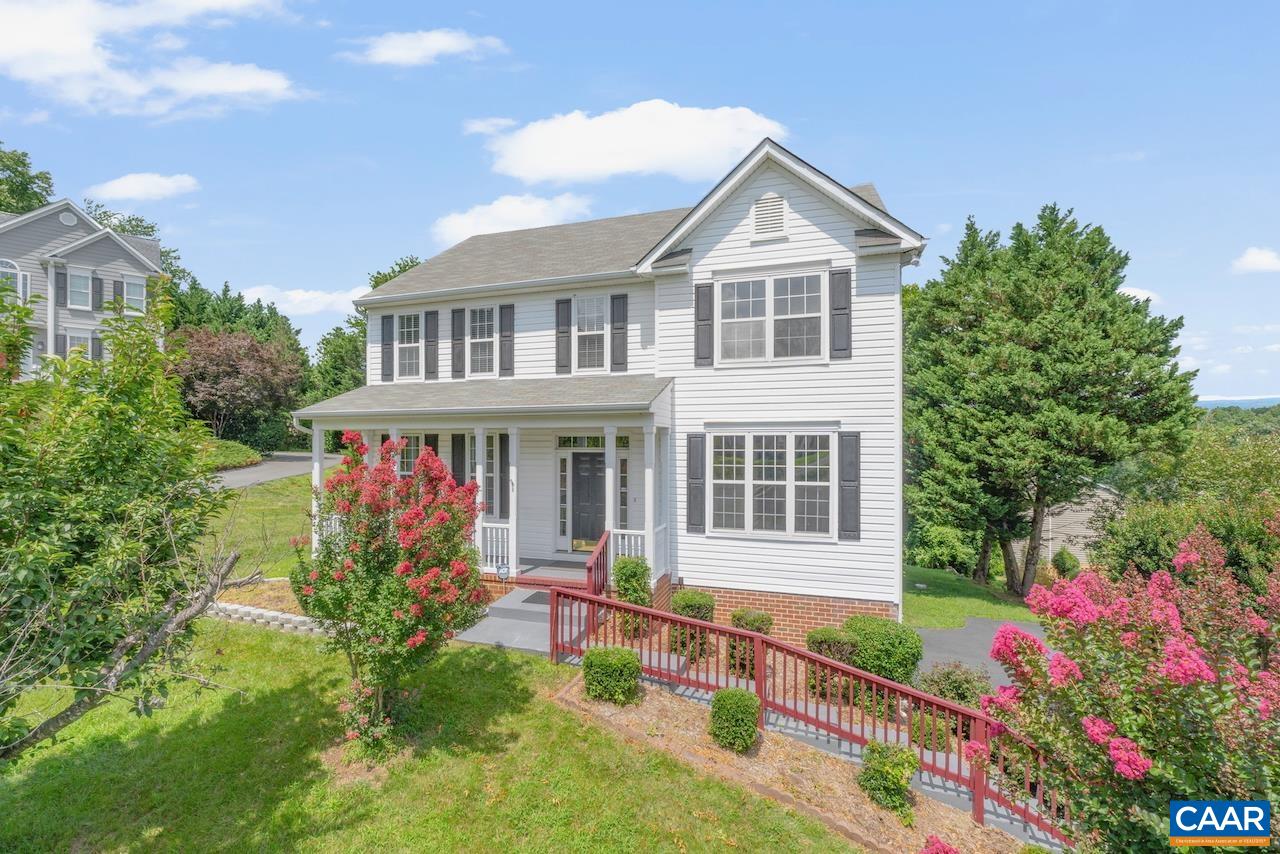 This sun-filled Foxcroft home offers effortless living! Enjoy authentic hardwood floors, a spacious kitchen with newer stainless appliances and granite countertops, plus abundant cabinet space overlooking the serene backyard and deck. The primary suite boasts a large walk-in closet, a soaring vaulted ceiling, and a tiled shower. The versatile basement features a new mini-split for highly efficient heating and cooling, a full bath, and a comfortable family room opening to the backyard. Experience vibrant community amenities like a sparkling pool, inviting clubhouse, well equipped  playground, and picturesque picnic area, all set against breathtaking mountain views.