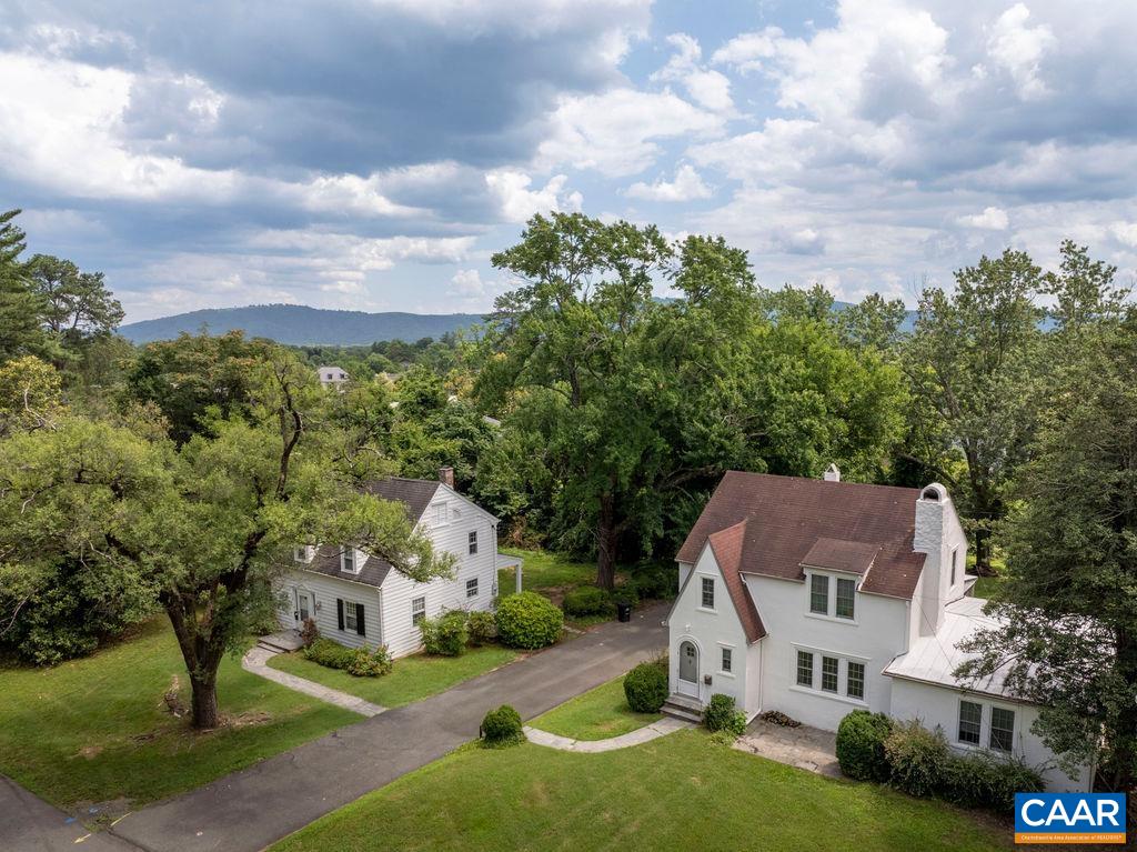 Unique opportunity to purchase TWO houses on Stadium Road. Both parcels combined total .71 acres in a prime UVA-adjacent location, right across the street from Runk Dining Hall. Each house is character-rich with many original details preserved, including hardwood floors, craftsman-trim, original glass doorknobs, plaster walls, built-ins (2203), gas fireplace with brick surround (2201), an incredible stone fireplace (2203), generously-sized spaces, and dedicated dining rooms. Large, level lot is a rare find in Charlottesville. 2201 is 3 bedrooms, 1.5 bathrooms. 2203 is 3 bedrooms, 2 full bathrooms with an attached guest/caregiver space that is 1 bedroom, 1 full bathroom (no kitchen). These houses are GEMS, with some updates they could be fantastic single-family homes or upscale rentals. OR, consider the future possibilities of increasing density in a prime UVA location.