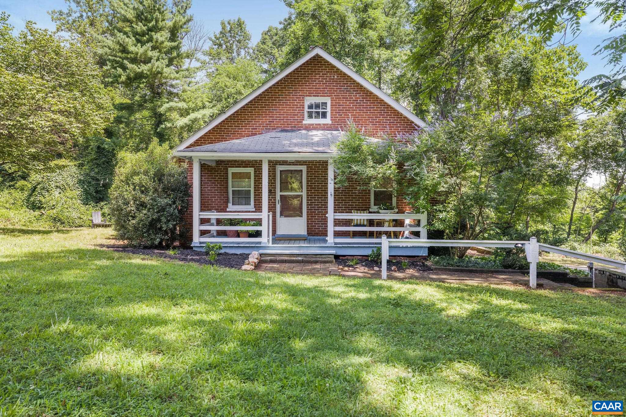 Rare opportunity in the heart of Ivy! This offering includes two adjoining parcels totaling 8.25 acres just minutes from UVA, Farmington, and Boar’s Head. Tucked away on 3.19 private acres, a charming 1940s brick bungalow features original hardwood floors, moldings, and mature landscaping - an ideal guest cottage, income-producing rental, or an interim residence while you build your new home. The adjacent 5.06-acre buildable lot is fairly level and partially fenced - perfectly suited for a custom home with pastoral views, a great yard with a future pool or sport court. With an unbeatable close-in Ivy location within Murray/Western Alb schools, this property combines immediate livability with long-term investment potential.