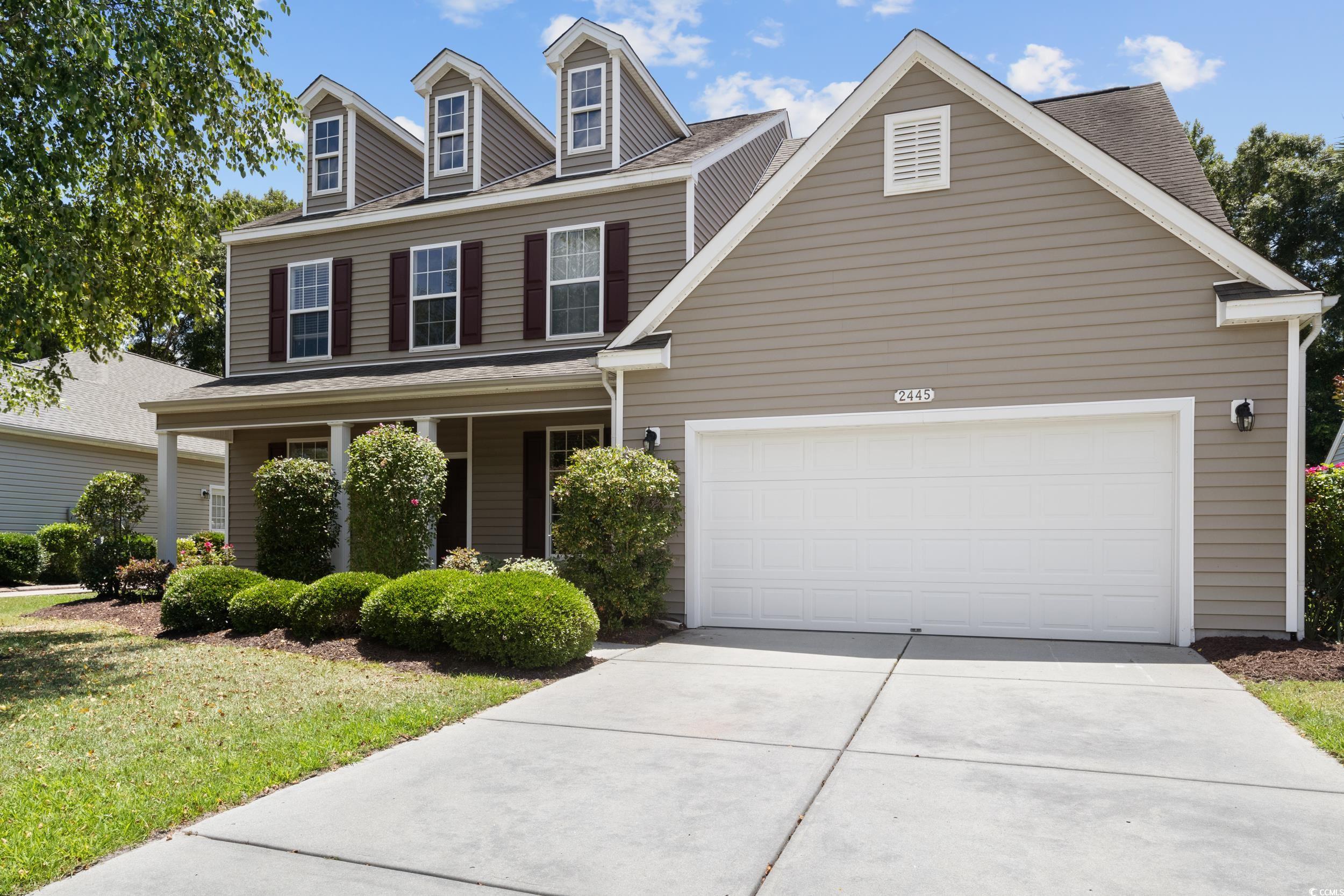 Seller welcomes any and all offers  NEW ROOF is INSTALLED August 2024!!  What an amazing find in Carolina Forest's most Popular neighborhood. This 5 bedroom, 2 1/2 bath home is turnkey and ready for a new owner. Home features a formal dining room, large flex area, open floor plan that flows from the kitchen into the great room with vaulted ceilings through the second floor. Eat in kitchen, smoke appliances including washer and dryer.  The Primary bedroom is on the first floor and features a garden tub, shower, double vanity, and a walk-in closet.  Upstairs has 4 bedrooms with a full bath.  The outside is located on a quiet street with an attached 2 car garage and room for two additional vehicles in the driveway. The rear of the home is white picket fenced with an enclosed patio with the EZ Breeze system.  Large, poured concrete patio that is perfect for a fire pit, barbeque, family gathering. The backyard is large and has lots of room for children or pets to have a safe protected space.  This neighborhood features two amenity centers that offer pools, children's playground, gym, basketball courts, and sidewalks throughout the community. Make your appointment today.