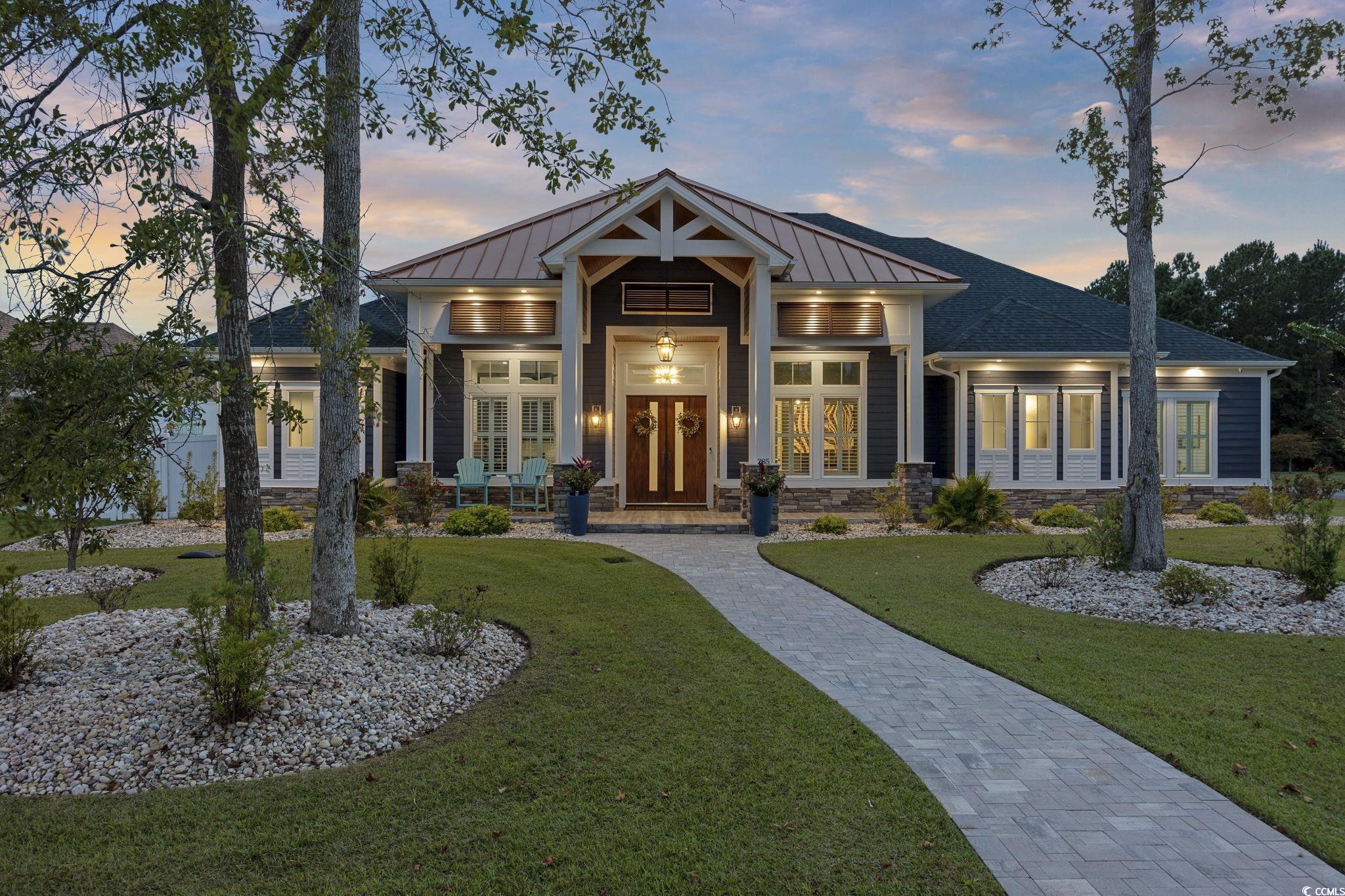 Welcome to this Resort style home located in the quiet neighborhood of Planters Creek. The exterior of this stunning home boasts a metal accent roof, stone, Bahama shutters, extensive trim, and copper accents.  As you stroll down the paver walkway, you are greeted by a beautiful front porch with stone and granite columns.  As you enter the foyer you encounter an office/den on each side, each with their unique design. The expansive great room/kitchen/dining area make area phenomenal for entertaining.  The great room features a stone fireplace, custom coffered ceiling, dry bar and 20ft sliders that lead out into the lanai and pool area.  The custom-built wood island is a true piece of art.  The blue and teal epoxy flows down the middle of the island and it's waterfall sides.  European cabinets, beam ceilings, and mixed metal appliances complete this unique kitchen.  The dining area features a blue accent wall and plenty of windows to enjoy the resort view. The left side of the house is the expansive master suite.  The bedroom features a stained wood ceiling, coffee bar, and a sitting area with a private entrance out to the covered lanai, pool, and hot tub.  The master bath is adorned with double vanities, plenty of cabinets for storage, ceiling details, soaking tub, and custom tile steam shower.  The right-side features two additional large bedrooms with two additional baths, both with custom tile showers.  Beautiful tile flows through the entire house. Upgraded trim, motorized shades, surround sound are a few of the many upgrades.    This magnificent home also includes a three-car attached garage with epoxy floor with the third garage tall enough for a boat or a small motorhome.   The resort style pool area includes an outdoor kitchen, gas fireplace, second lanai, wood ceilings, outdoor shower, and hot tub. The pool is surround by limestone pavers that stay cool in the heat. Tropical landscape, outdoor lighting truly makes this a private tropical paradise a place to escape and unwind.  The home comes furnished inside and out.    This luxury custom home is one of a kind.  Attention to detail is around every corner. It's unique design is a must to see and enjoy!!