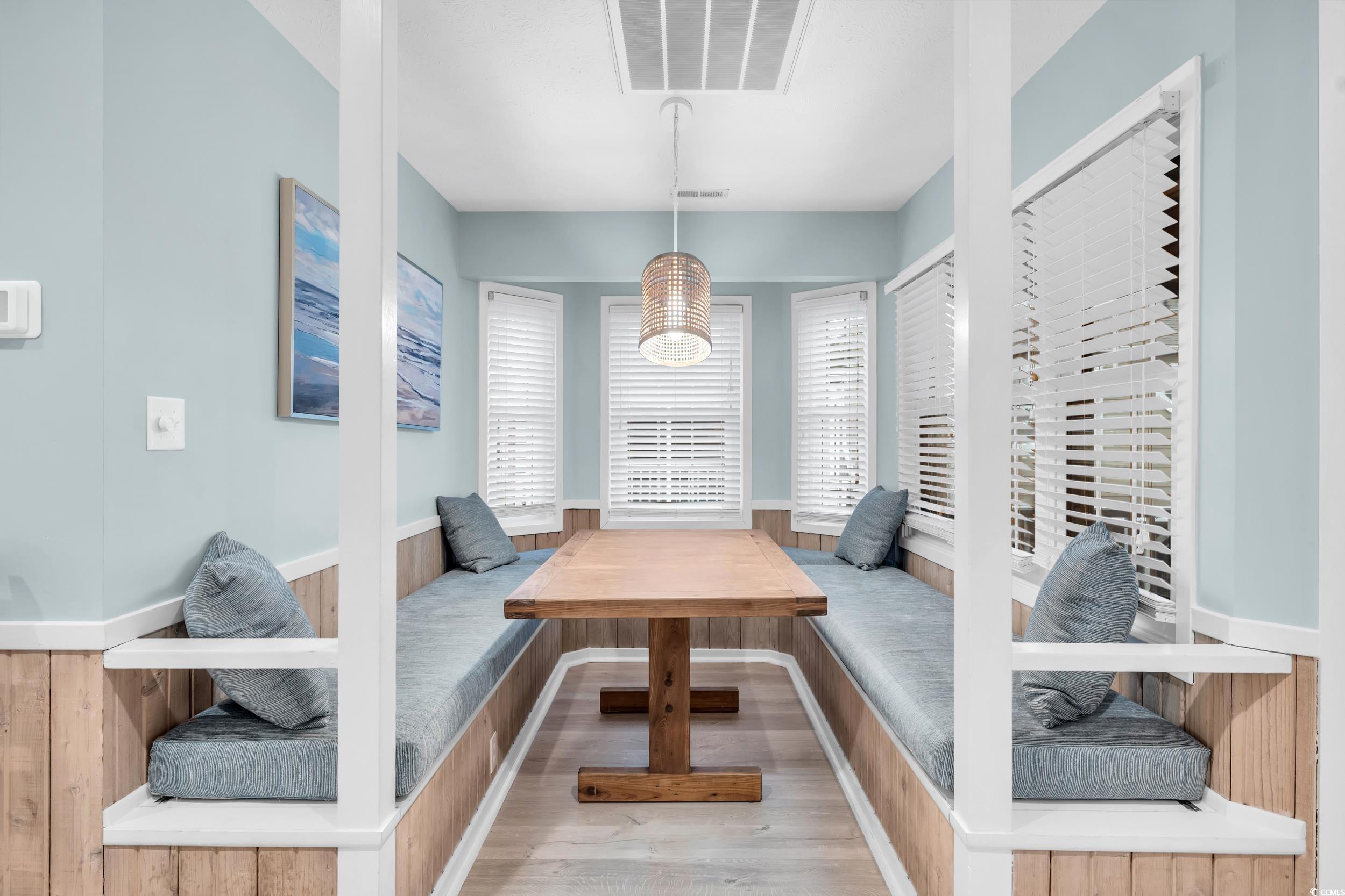 Dining area featuring breakfast area and light wood-type flooring