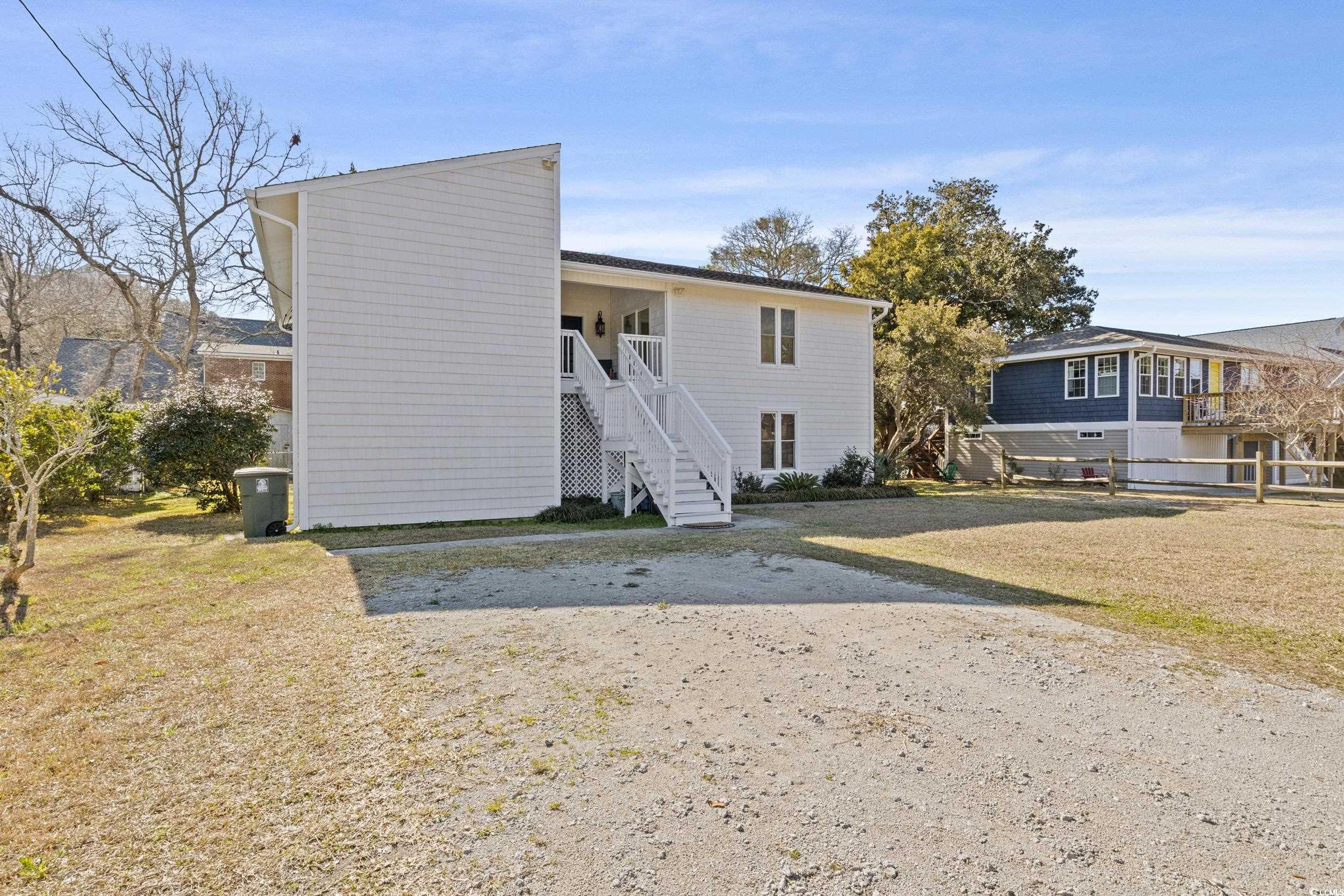 Adjusted Price Just for you! What an opportunity for your investment, second home, or primary home just two blocks from the beach.  Upstairs unit has a great deck overlooking the fenced backyard. Downstairs has a beautiful patio perfect for cookouts or family gatherings. A shed does convey on the property.  All this is only two blocks from the beach!! Both units offer 3 bedrooms and 2 full bathrooms.