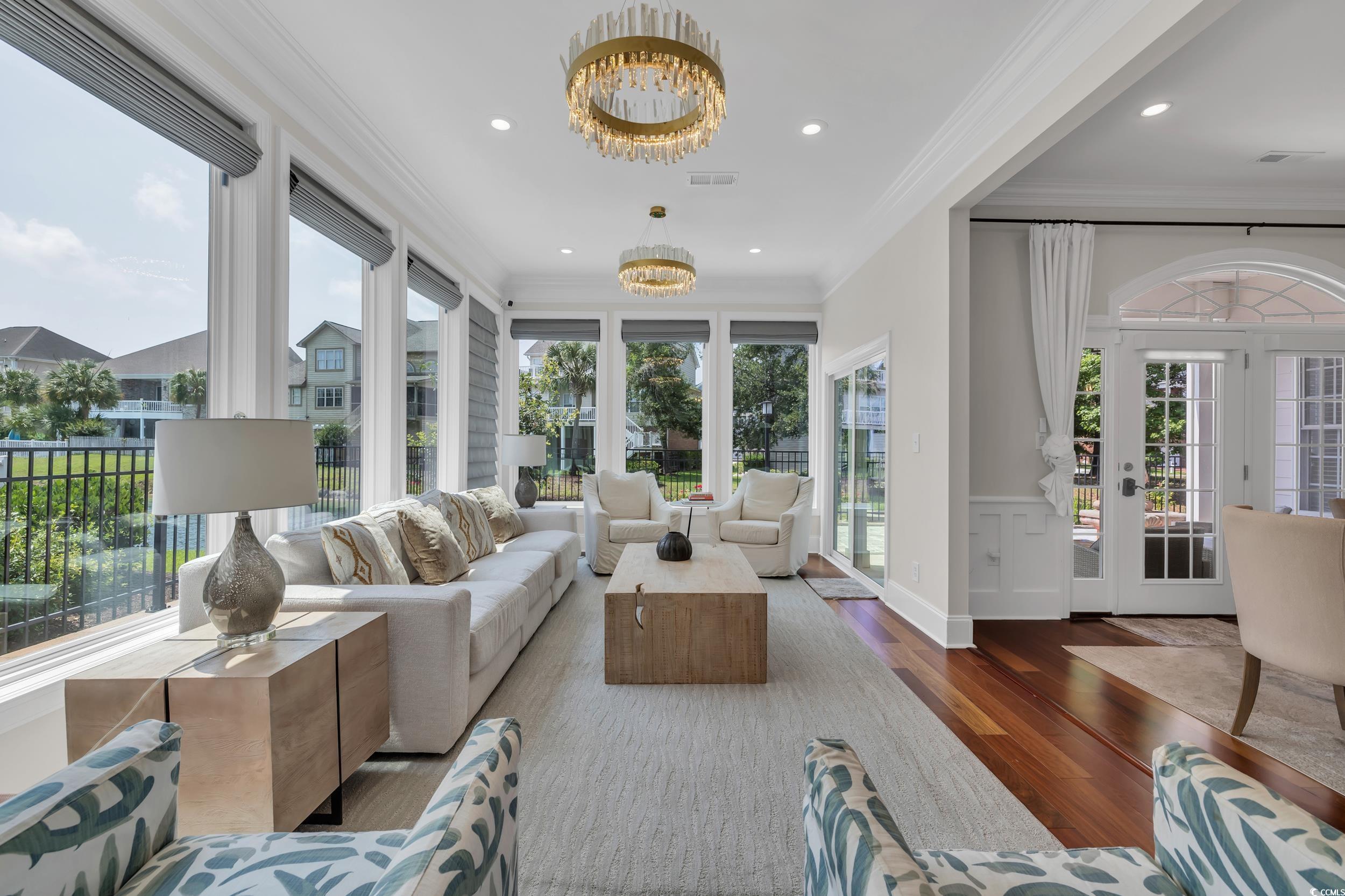 Sunroom featuring a chandelier and french​​‌​​​​‌​​‌‌​‌‌‌​​‌‌​‌‌‌​​‌‌​‌‌‌ doors