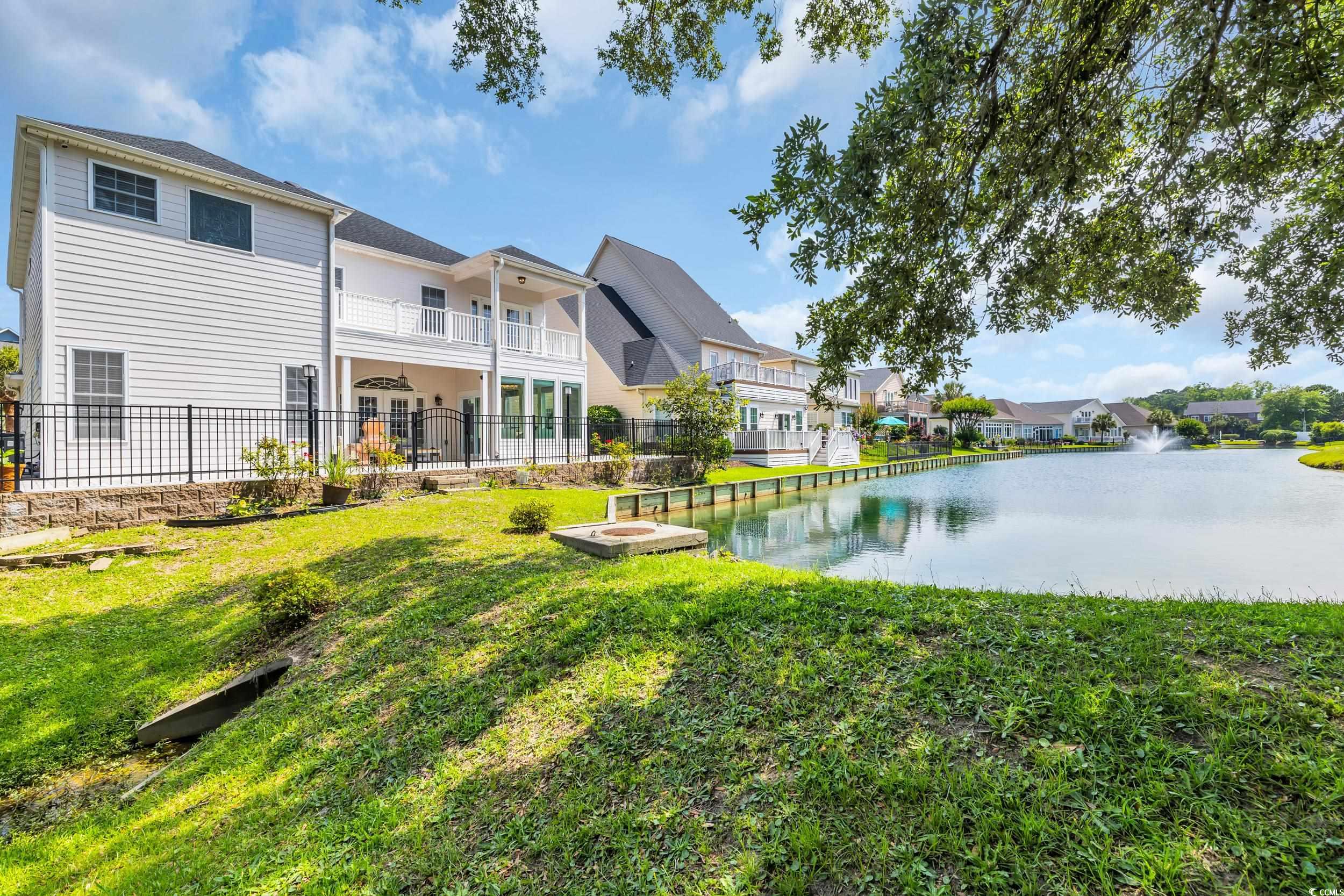 Water view featuring nearby suburban area