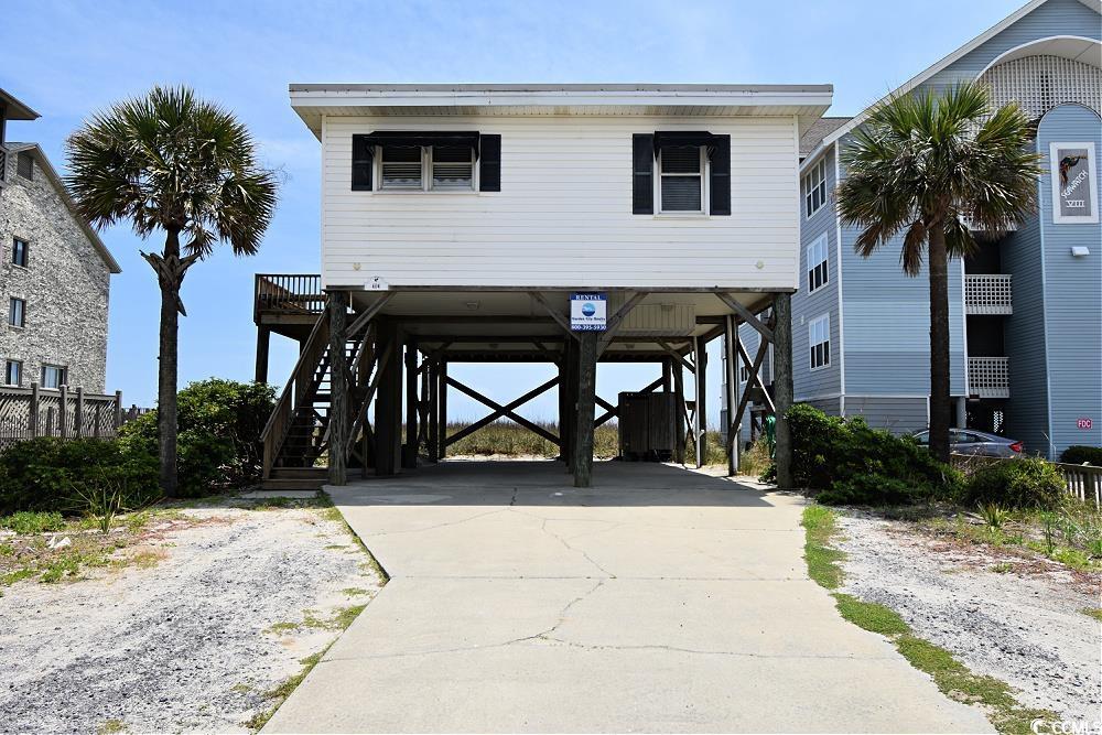 here is your opportunity to own a piece of oceanfront paradise in garden city beach!  this charming 2 bedroom, 2 bath beach cottage has made years of memories and is now ready for new owners.  if you need something bigger, this .23 acre lot has plenty of room to build a much larger beach house with a pool!  ask an agent today for more details or schedule your showing.  all information is deemed reliable, but verification is the responsibility of the buyer.