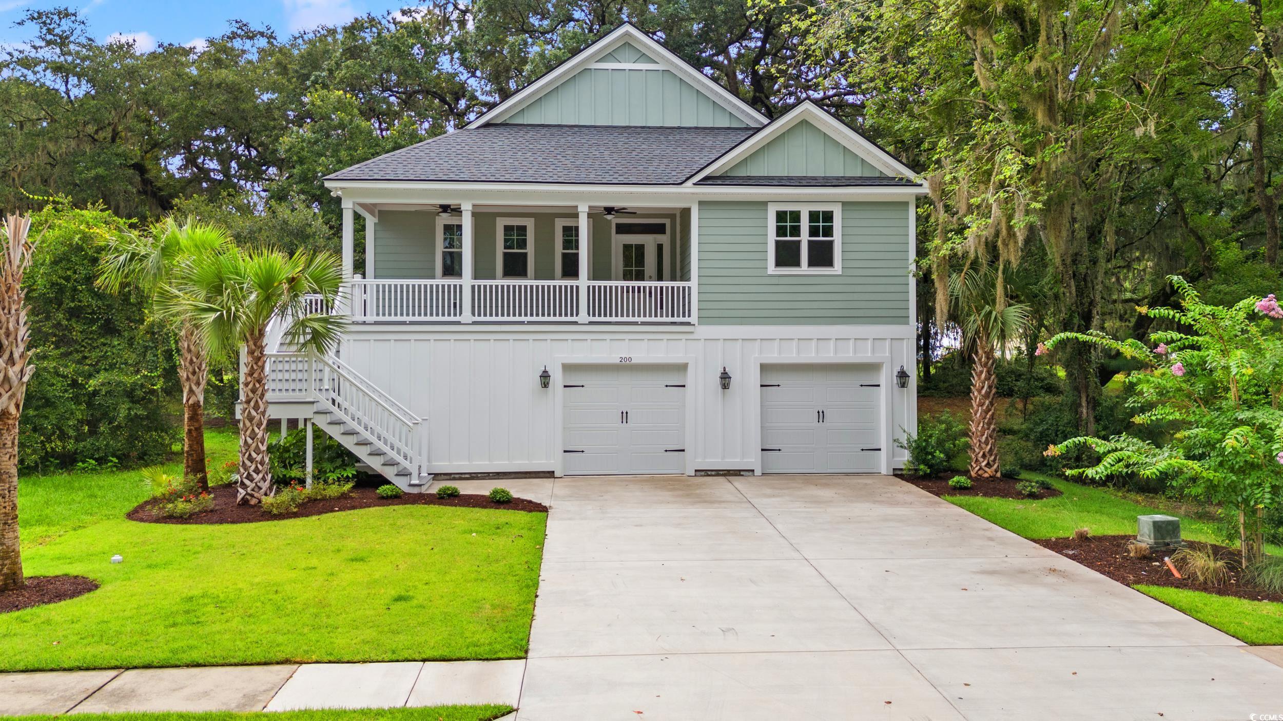 house is move-in ready! in a beautiful water front neighborhood! a low country style raised beach home in the oak at winyah with impressive standard features. sit on your brand new porch and watch the sunset over the sprawling winyah bay. close to the shops, restaurants, golf courses and beaches of georgetown and pawleys island. this home features many upgrades that most builders don't include. take comfort in one of our newly constructed homes that has a reputation for quality and value. whether you are a first-time home buyer or looking for your forever home, let us help you through the buying process and welcome you to your newly built home. building lifestyles for over 35 years, we remain the premier home builder of new residential communities and custom homes in the grand strand and surrounding areas. in 2022 and 2021, we received the best home builder award from wmbf news best of the grand strand. we began and remain in the grand strand, and we want you to experience the local pride we build today and everyday in horry and georgetown counties.   building lifestyles for over 35 years, we remain the premier homebuilder of new residential communities and custom homes in the grand strand and surrounding areas. we are three-time winners of the best home builder award from wmbf news best of the grand strand. in 2023, we were also voted best residential real estate developer in the myrtle beach herald reader’s choice awards. we began and remain in the grand strand, and we want you to experience the local pride we build today and every day in horry and georgetown counties.