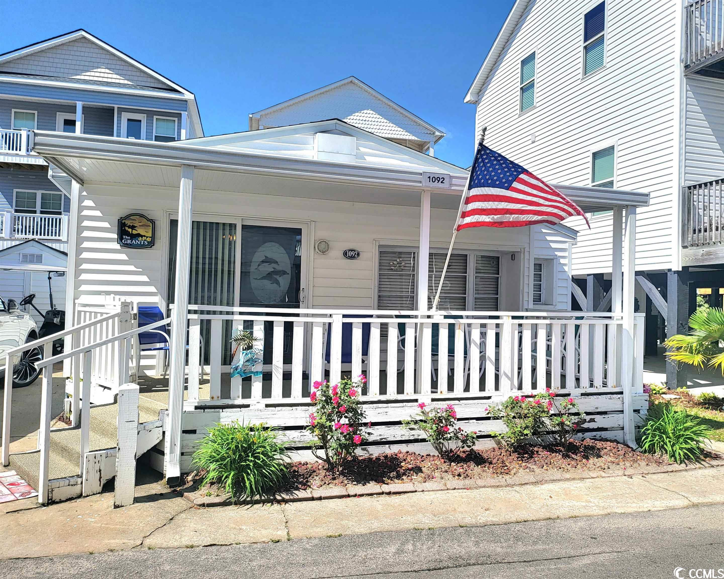 cute as a button beach cottage. 450ft to the beach. no need for a cart if you purchase this home. this 2 bedroom/ 2 bath cottage boasts a large eat-in kitchen, a split bedroom and so much more! new roof , new hvac and a new stove!! schedule you showing today!!