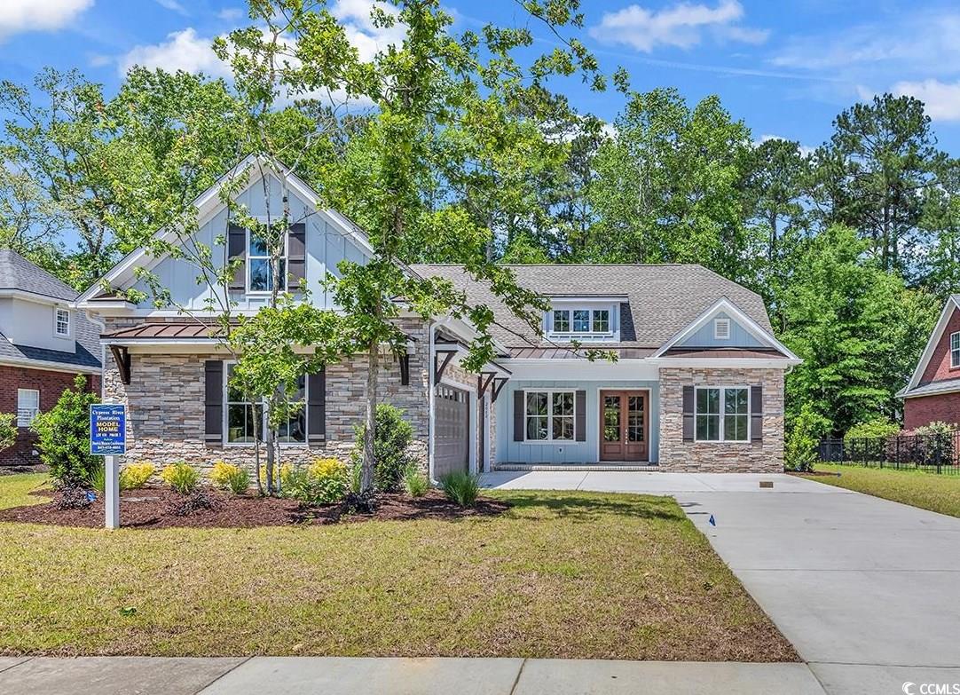 brand new brick house in one of the area's most desired neighborhoods, cypress river plantation.  cypress river has a boat landing, day docks, boat storage area, beautiful clubhouse, large outdoor pool and hottub, basketball and tennis courts, and best of all it has beautiful trees throughout and is located on the one of the most beautiful parts of the waccamaw river/intracoastal waterway.  the master suite has a spacious beautiful and well-appointed bathroom and walk-in closet, and there is smaller second master suite on the other side of the house---plus another two bedrooms down with bathroom between and a large bonus room/bedroom upstairs with its own full bathroom. the home backs up to an hoa green space, giving you privacy and a quiet peaceful setting and view that is not going to be disturbed!!  lvt and tile flooring, stylish cabinets through-out with quartz countertops in the kitchen and granite countertops in the bathrooms, top-line ge cafe kitchen appliances, including a built-in pullout microwave, unique blanton trim package, upgraded lighting, fireplace with built-in cabinetry in the large open living area, covered rear porch, oversized garage with a golf cart space and door, brick, lots of bathrooms,----this custom new home is one you must see to appreciate.  and same goes for the amenities!  come see it for yourself soon!  note that the builder has two other lots in cypress river where he will consider building a custom home for you if you have time--just have your realtor check into it for you.
