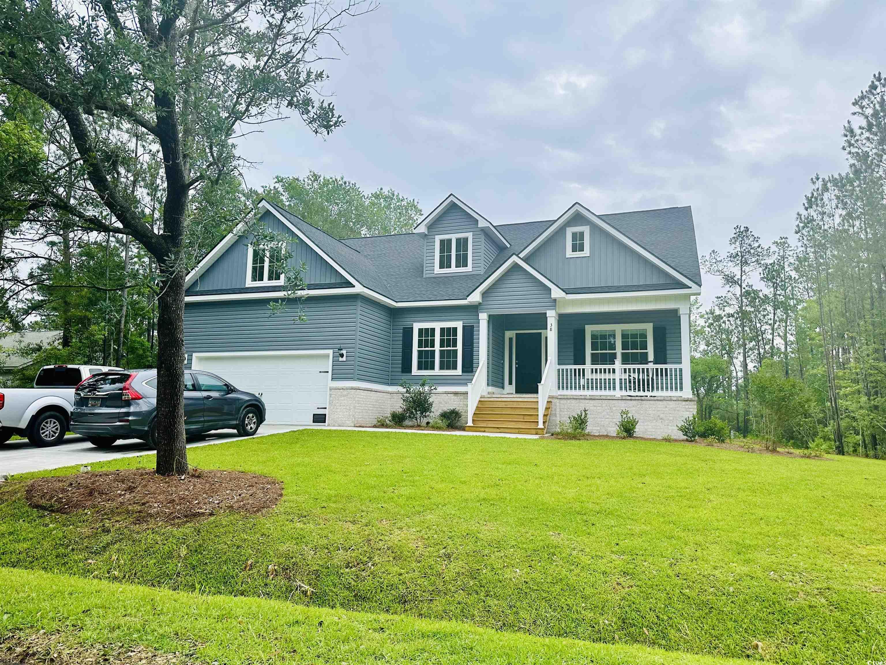 ready to move in!! a beautiful low country home on a beautiful golf course lot in wedgefield plantation! sit on your brand new covered porch and watch the sunset over the sprawling fairway. close to the shops, restaurants, golf courses and beaches of georgetown and pawleys island. this home features many upgrades that most builders don't include. take comfort in one of our newly constructed homes that has a reputation for quality and value. whether you are a first-time home buyer or looking for your forever home, let us help you through the buying process and welcome you to your newly built home. pictures are of a similar build. building lifestyles for over 35 years, we remain the premier home builder of new residential communities and custom homes i the grand strand and surrounding areas. in 2022 and 2021, we received the best home builder award from wmbf news best of the grand strand. we began and remain in the grand strand, and we want you to experience the local pride we build today and everyday in horry and georgetown counties.