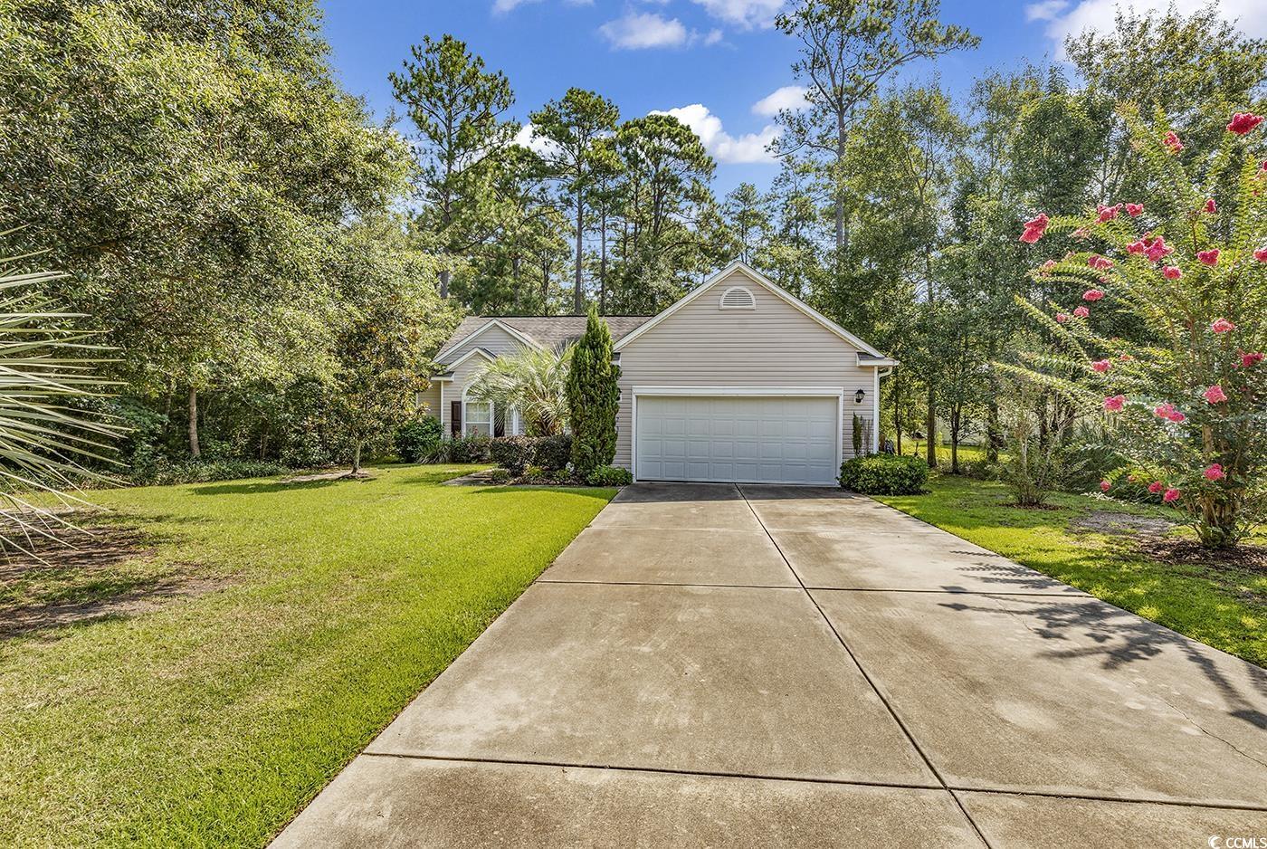 this charming three-bedroom, two-bathroom residence is nestled in the sought-after heritage preserve neighborhood on a spacious estimated 0.76-acre lot. step inside and be captivated by the well-maintained, sunlit open floor plan. the kitchen flawlessly adjoins a well-lit breakfast nook and living area, featuring a cozy fireplace for added comfort. retreat to the master bedroom with an ensuite bath featuring a separate shower, garden tub, and walk-in closet. relax in the gorgeous carolina room or enjoy the peacefulness of the porch on a secluded, wooded lot surrounded by mature trees. take note of the fully fenced backyard, offering privacy and ample space for entertaining. at heritage preserve, there are many things to enjoy outside, like a playground, pool, and outdoor pavilion, which are perfect for outdoor activities. conveniently located just off highway 90, heritage preserve offers easy access to international drive and is minutes away from downtown conway, coastal carolina university, attractions, the beach, restaurants, and shopping. do not miss out - schedule your appointment today!