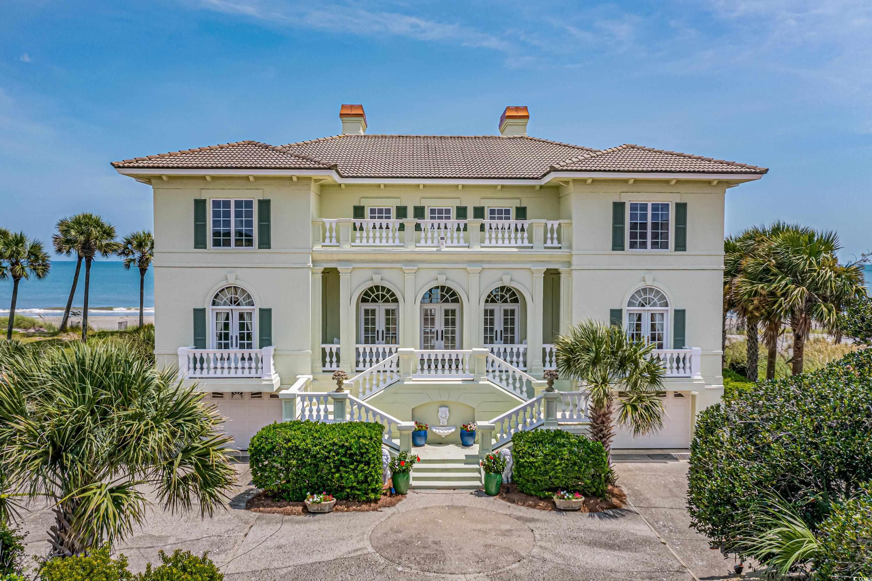 introducing an unparalleled mediterranean classic home on the oceanfront! welcome to 1277 debordieu boulevard, where upscale living meets the breathtaking beauty of coastal south carolina. this mediterranean-style oceanfront home is a true statement of elegance and sophistication, offering a lifestyle like no other. as you approach this exclusive residence, you're greeted by a grand gated entrance, framed by mature landscaping, setting the stage for what lies beyond. the mission-style tiled roof and the meticulous attention to detail are immediately apparent. step inside, and you'll be captivated by the glamorous entryway, featuring a delicately sweeping curved split staircase, adorned with a dazzling crystal chandelier. this is just the beginning of the opulence that awaits you.the grand oceanfront living room is a masterpiece, boasting a coffered ceiling, polished marble floors, a gas fireplace, and elegant corinthian columns. the space is tastefully accented by handsome molding, creating an atmosphere of timeless luxury. the kitchen is a chef's dream, with ocean views that will inspire your culinary adventures. it opens to a beachfront veranda, inviting you to savor the sunrise with your morning coffee. equipped with a center island, gas range, an additional 2-burner cooktop, double ovens, and built-in display cabinetry, it's perfect for both intimate family meals and grand gatherings. the butler’s pantry provides ample serving and storage space, complete with a warming drawer, ensuring effortless entertaining and a seamless flow to the formal dining room. for those seeking relaxation or a quiet escape, the main level also features an impressive den/library/media room. here, a retractable projector screen awaits your entertainment desires, while a built-in desk and shelving make it ideal for work or leisure. paneled walls of cherry wood and a private beachside terrace add to the allure. adjacent to the formal living room, you'll find a well-appointed wet bar that connects to the study, creating the perfect setting for socializing. upstairs, discover the five luxurious sleeping chambers, each with en suite baths. three of these bedrooms boast breathtaking oceanfront views. the primary suite is a sanctuary, featuring a sitting area with a fireplace, a private oceanfront balcony, a dressing room area with a walk-through cedar closet and an additional walk-in closet, and a primary bath with a stand-up shower, double vanity, and an oversized soaking tub with unparalleled ocean vistas. the additional four guest suites offer substantial closets, intelligently designed for ample storage. convenience abounds, thanks to a ground-to-third-floor elevator, ensuring easy access to every level of this remarkable home. for those who crave added privacy and space, an adjacent ½ acre+ backflag oceanfront lot is also available for purchase. historically used as a garden spot, this expansive site offers endless possibilities. beyond the confines of this stunning estate, 1277 debordieu boulevard is nestled within the debordieu colony, a private residential community spanning over 2,700 acres of natural beauty. here, you'll find a diverse range of landscapes, including marshes, creeks, and maritime forests. but the crown jewel is the pristine six-mile beachfront that beckons you to explore. as a resident of debordieu colony, you'll enjoy access to outstanding amenities via membership to the debordieu club. a private pete dye golf course offers a challenging and scenic experience for golf enthusiasts. there's also a tennis club with a fitness center, swimming pools, a golf clubhouse, and an oceanfront clubhouse, which is undergoing a spectacular renovation. 1277 debordieu boulevard is more than just a luxury home; it's an invitation to experience an unparalleled coastal lifestyle in a secluded and natural setting. discover the extraordinary at this unrivaled location. your mediterranean dream home awaits.