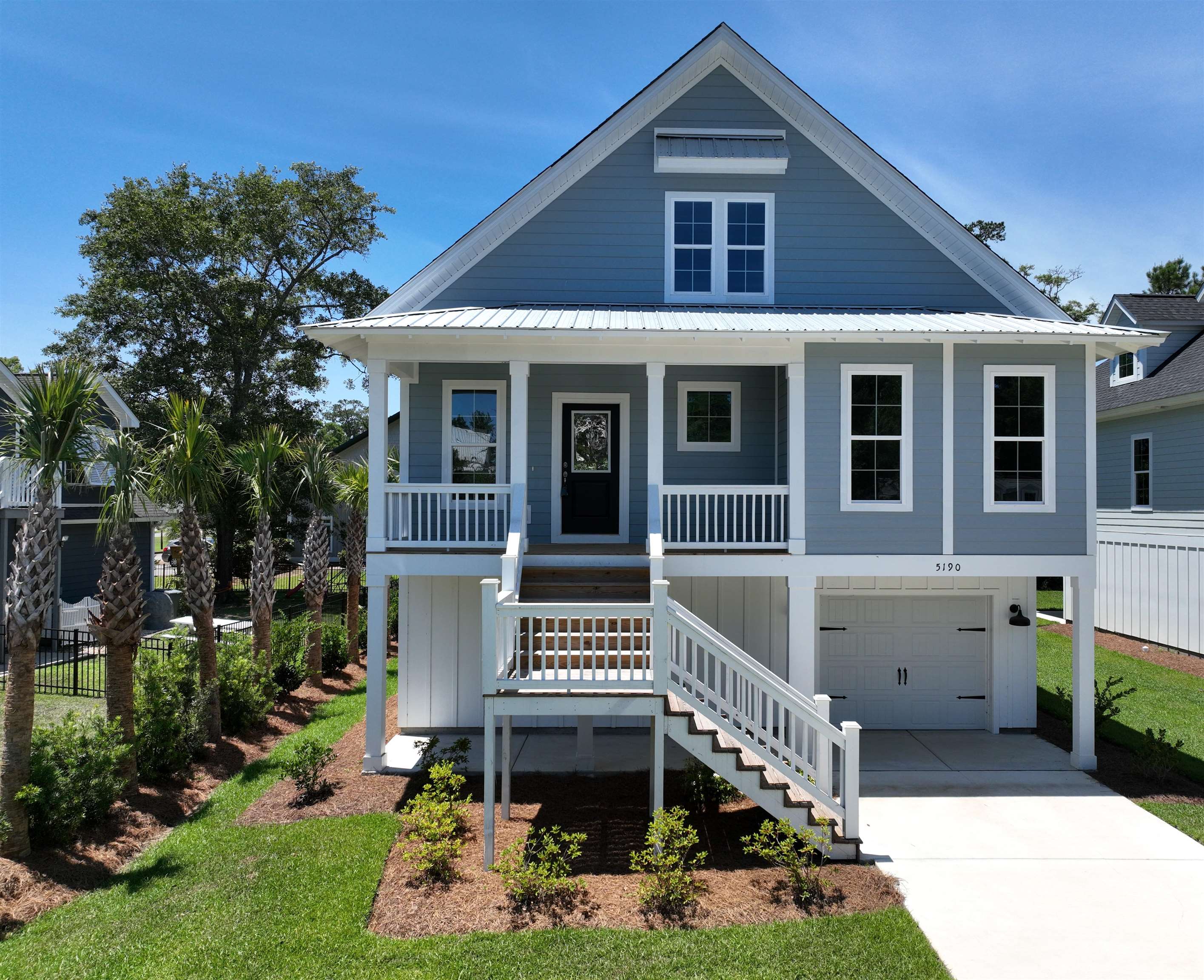a stunning new construction raised beach style home that perfectly embodies southern charm. with its low maintenance fiber cement siding, this home effortlessly blends elegance with durability. the exterior showcases the essence of southern living, while the spacious backyard offers endless possibilities for relaxation and recreation. but that's not all! picture yourself taking in the tranquil beauty of the marsh, just a short walk away. whether it's peaceful nature walks or adventurous water activities, the marsh provides the perfect backdrop for your outdoor pursuits. step inside and be captivated by the open layout, designed to optimize space and flow. the front and rear porches beckon you to unwind, sip on sweet tea, and enjoy the soothing coastal breezes. in the kitchen, sleek stainless steel appliances add a modern touch, while the luxurious quartz countertops require minimal maintenance, giving you more time to savor the joys of coastal living. every step you take is cushioned by elegant luxury vinyl plank flooring, infusing the home with both style and practicality. and do not overlook the convenience of the spacious laundry room, providing ample storage and organization options.  retire to the master suite, a sanctuary of indulgence. the large master shower, with its tiled walls, offers a luxurious bathing experience. the split master vanities provide added convenience, while the master walk-in closet, complete with wire shelving, ensures that your wardrobe is always beautifully organized. expand your living space outdoors on the large covered patio, where you can entertain guests or simply enjoy the serenity of your private oasis. and for added comfort and accessibility, an elevator is ready to whisk you effortlessly between floors. in this new construction raised beach style home, every detail has been thoughtfully considered to create a haven of comfort and luxury. don't miss the chance to make this extraordinary residence your own. begin your southern lifestyle adventure today in this exceptional home that promises to exceed your expectations. all measurements are approximate and not guaranteed. buyer subject to verification.