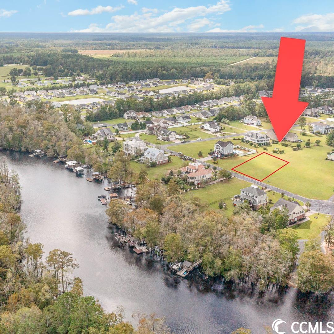 this half acre lot in pottery landing is ready for your dream home. pottery landing is a gated community off of hwy 701 s in conway and is just 10 minutes to downtown conway and about 30 minutes to myrtle beach. the community features a community boat landing into the waccamaw river and a community clubhouse and pool.