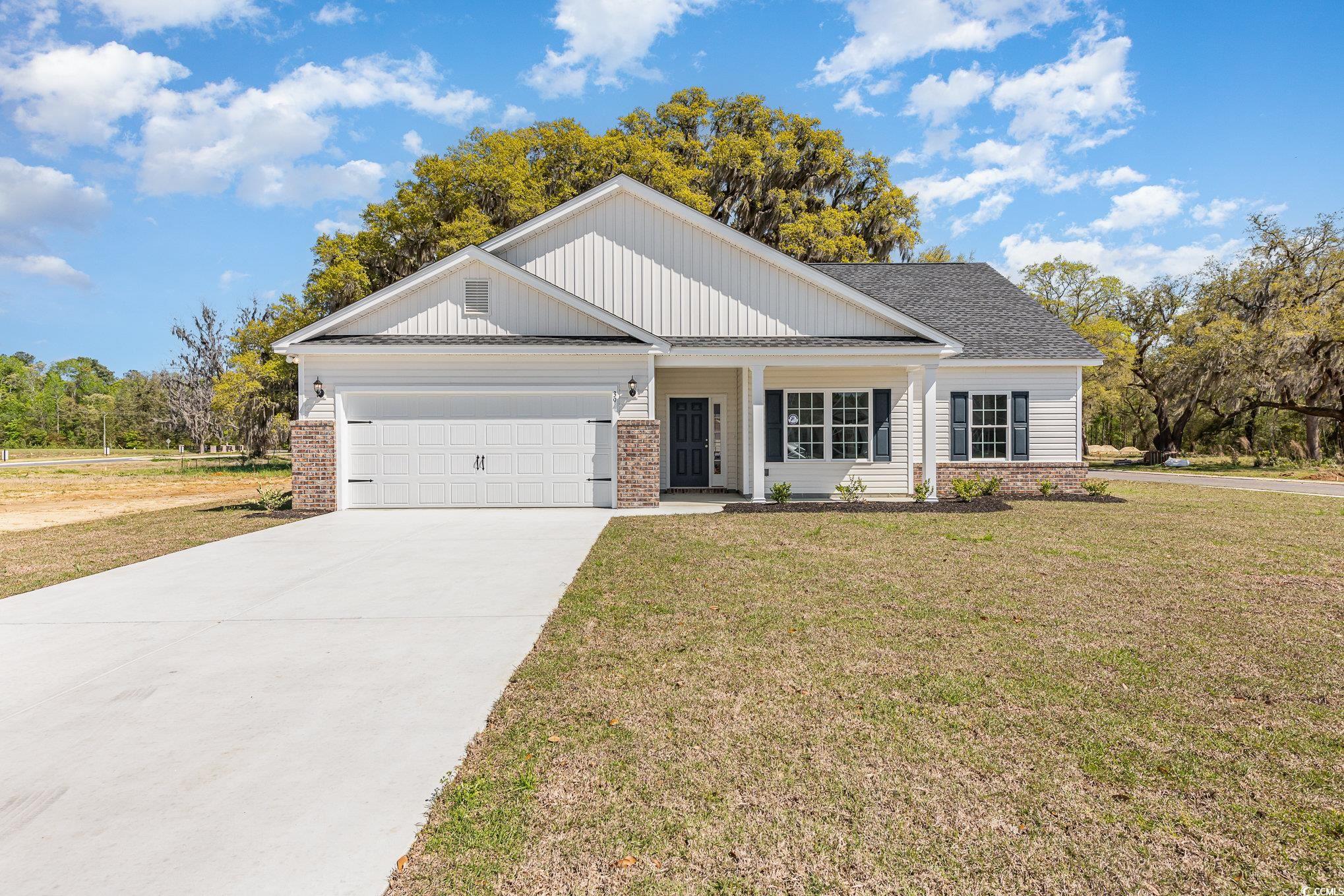 this beautiful beaufort plan is an open floor plan with 3 bedrooms and 2 full baths.  it features beautifully vaulted ceilings in the living room, covered porch off of the living room, beautiful granite kitchen countertops, upgraded shaker style kitchen cabinets, upgraded luxury vinyl plank flooring in the main living areas, tray ceiling in the primary bedroom, walk in shower in the primary bath and so much more!   peru plantation is a premier neighborhood located in historic georgetown, sc.  peru plantation is on 173 acres of absolutely stunning grounds with rich history and majestic oak trees.  building lifestyles for over 35 years, we remain the premier homebuilder of new residential communities and custom homes in the grand strand and surrounding areas.  we are three-time winners of the best home builder award from wmbf news best of the grand strand.  in 2023, we were also voted best residential real estate developer in the myrtle beach herald readers' choice awards and best home builder in the sun news best of the beach contest.  we began and we remain in the grand strand, and we want you to experience the local pride we build today and every day in horry and georgetown counties.   we are dedicated to excellent craftsmanship and customer service and each home is built with pride.   each home here in peru plantation will be adorned with low country charming front porches, brick accents, fully finished and painted two car garages and back covered porches that will be great for entertaining out of doors.  this home is ready for a quick move in!