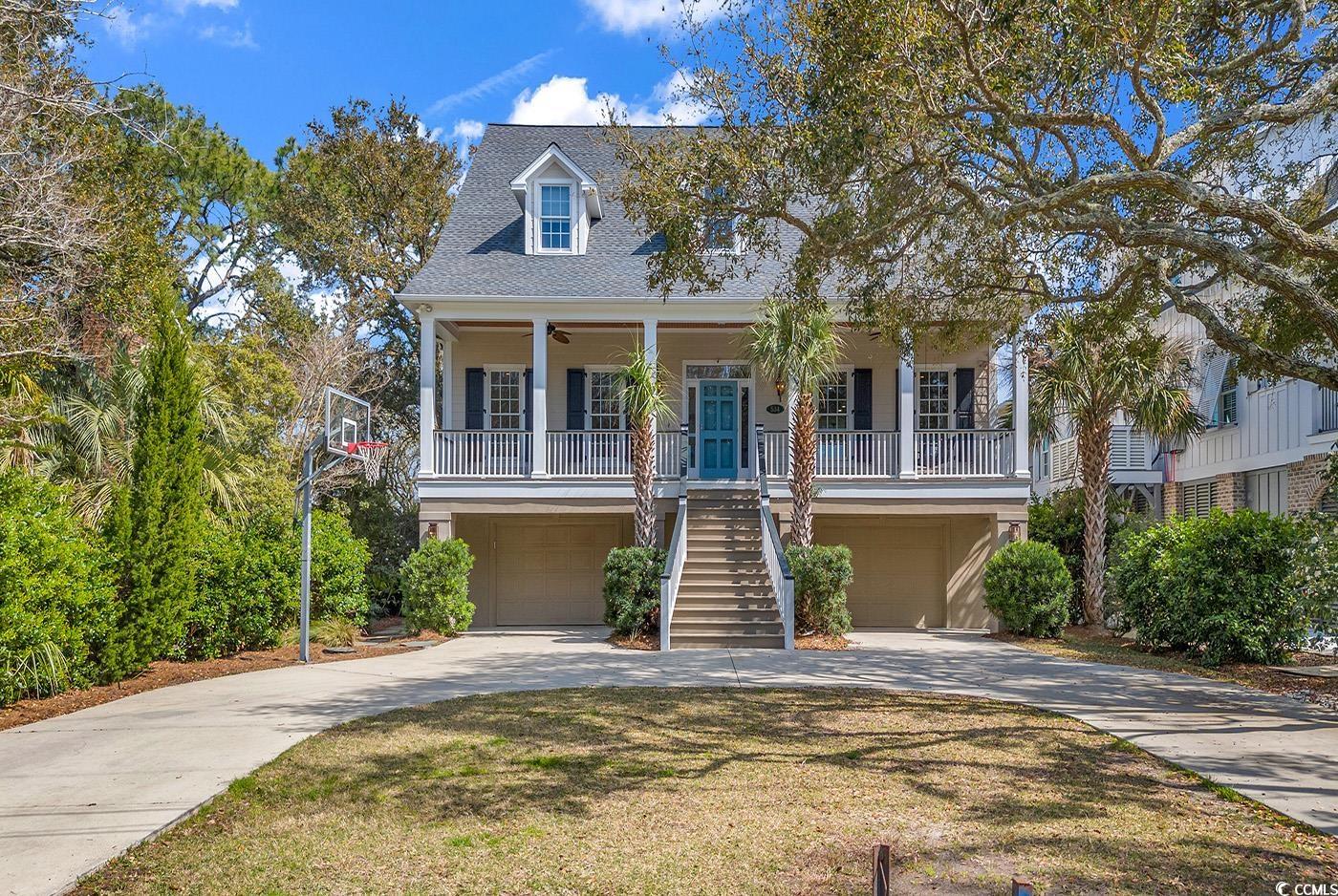 presenting a rare opportunity to own this gorgeous custom built waterfront home located in the highly desirable mt. gilead community in murrells inlet. this property is located on the main deep water channel with unparalleled views of garden city beach and murrells inlet. step inside this lowcountry residence with four bedrooms, three full baths and one half-bath. the large master suite offers a seating area with unmatched panoramic views of murrells inlet and garden city beach with sliding doors leading to a large screened porch. a large master en-suite bathroom boasts dual vanities, a custom tiled shower, large jacuzzi tub, and his and hers walk-in closets. the main floor guest bedroom may also serve as a study or office with custom built in shelving. the two top floor guest bedrooms are spacious with one boasting a gorgeous view of murrells inlet with access to the second floor screened porch. this home offers an elevator that travels to all floors. this property includes 1800 square feet of enclosed space under the house for garage and storage. for the boating and fishing enthusiasts, this property is perfect. it sits on deep water at all tides. it boasts a brand new stationary dock and walkway. you can step out of your back door, get on your boat at your private dock and within minutes be fishing in the inlet or atlantic ocean, cruise to the murrells inlet marshwalk for lunch or dinner, or cruise to garden city point for a fun day on the beach. this home is ideal for entertaining guest both inside and out with a large open living room with gas fireplace and custom cabinets, custom wet bar with under the counter wine fridge, double screened porches, outdoor shower and bathroom, and salt water swimming pool located on the water front with stationary and floating docks. don’t miss out on this exceptional opportunity to be on the main channel in murrells inlet located in a great neighborhood. a piece of paradise is at your fingertips.